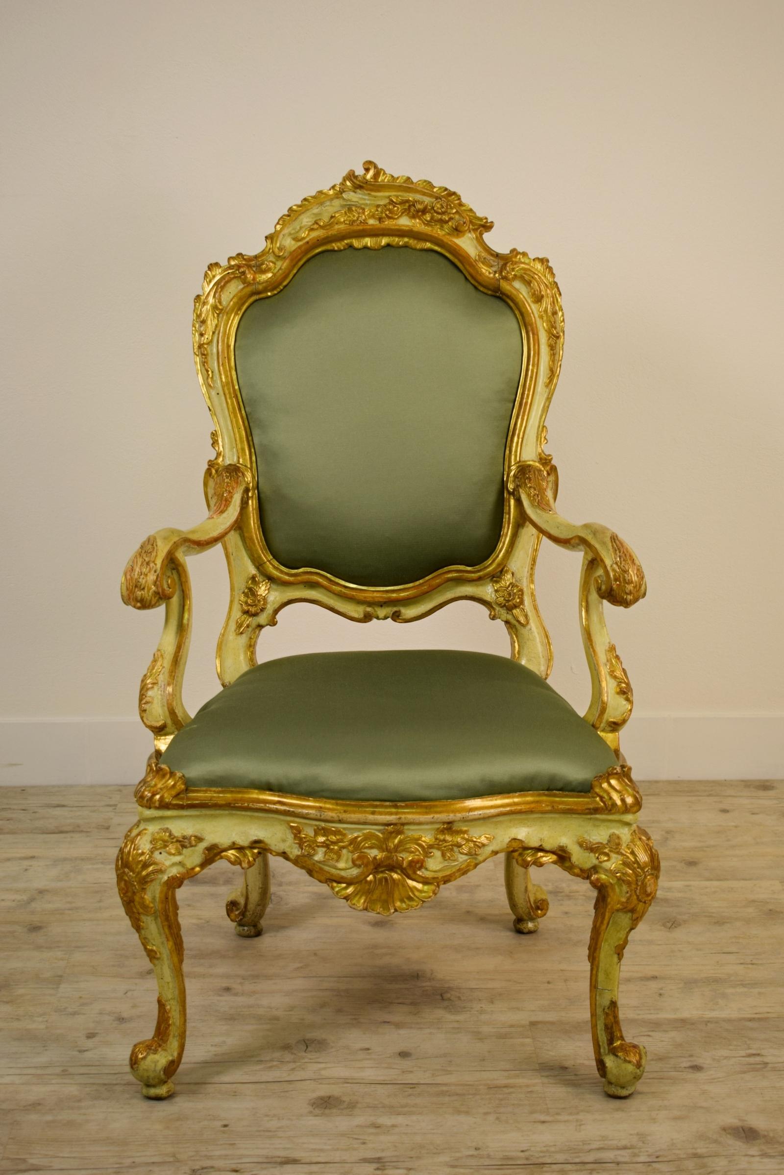 18th Century Venetian Lacquered and Gilded Wood Armchair

These beautiful armchair, in richly carved wood, was made in Veneto (Italy) in the 18th century. The fretworks with volutes and phytomorphic ornaments are beautifully gilded, on a lacquered