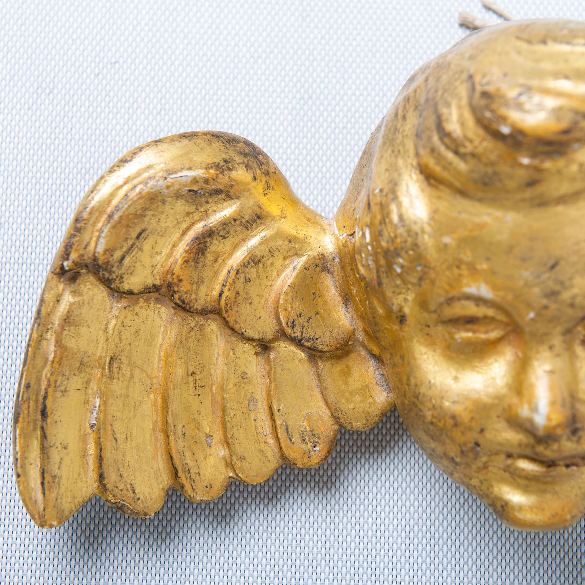 Néoclassique Tête d'ange dorée en vente