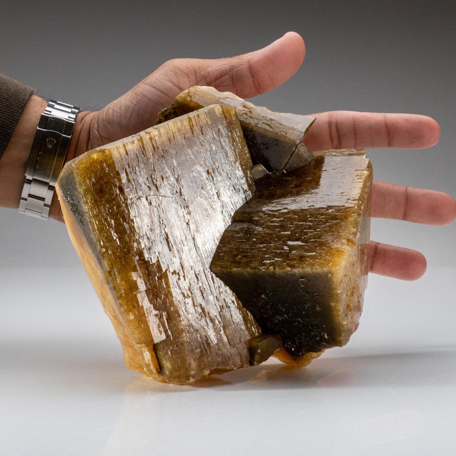From Nandan County, Hechi, Guangxi, China

Large blocky crystals of yellow-brown barite crystals in parallel orientation with contact on the bottom edge where they were attached. The barites are translucent and show internal growth