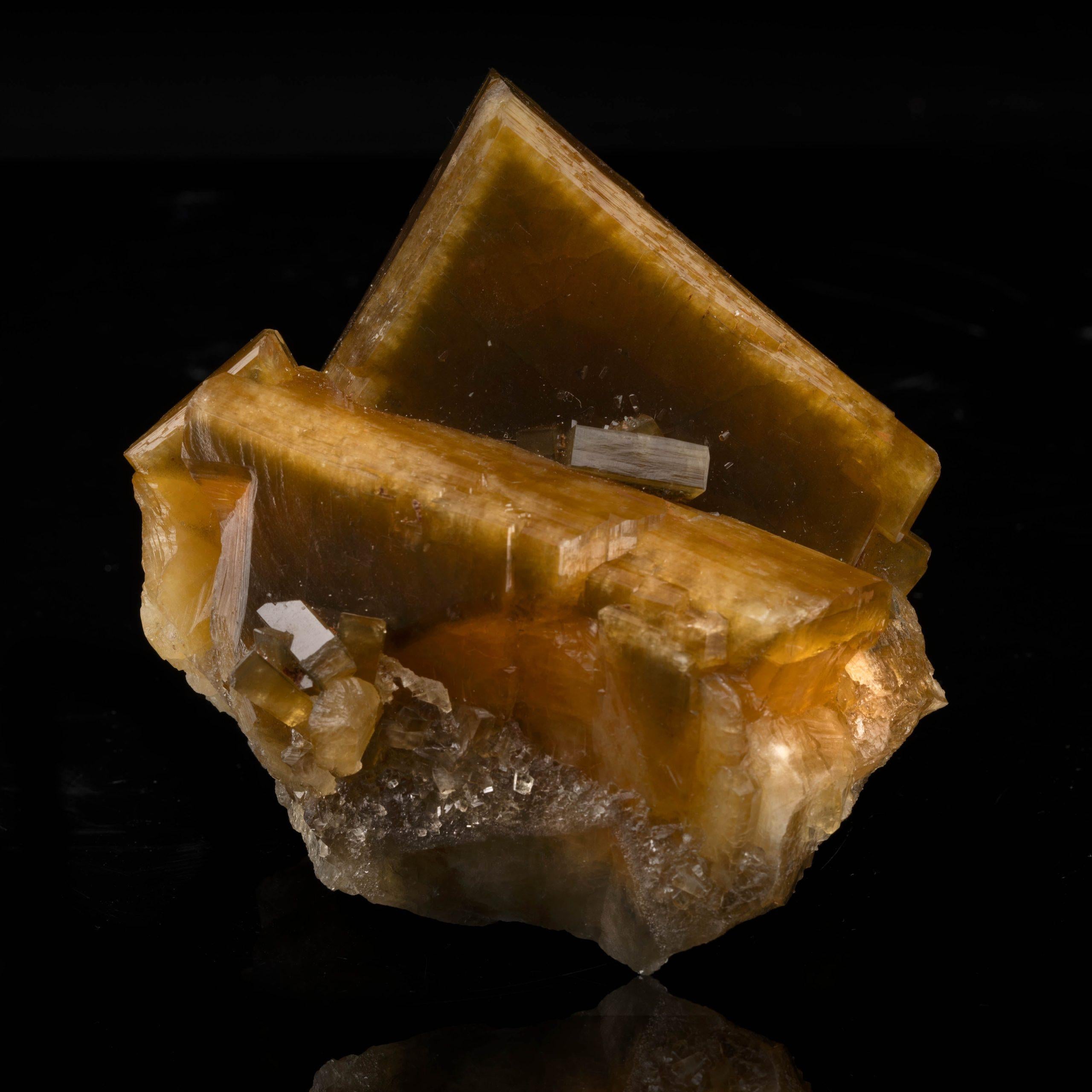 This hefty golden barite from China, location of a number of substantial golden barite finds, features huge, dense, beautifully formed crystals with great natural luster. Golden barite is rarer than more common blue, white, and gray barites and