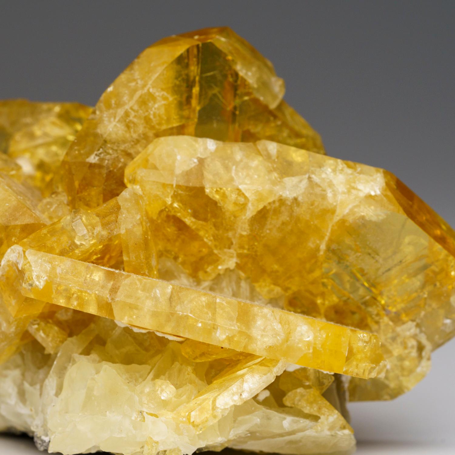 From Lushi, Henan Province, China
Long cluster of large, blocky crystals of yellow-tan barite crystals. The barites are translucent and show internal growth phantoms. A must-have for any collection!

Weight: 451.7 grams, Dimensions: 4 x 3 x 2.5