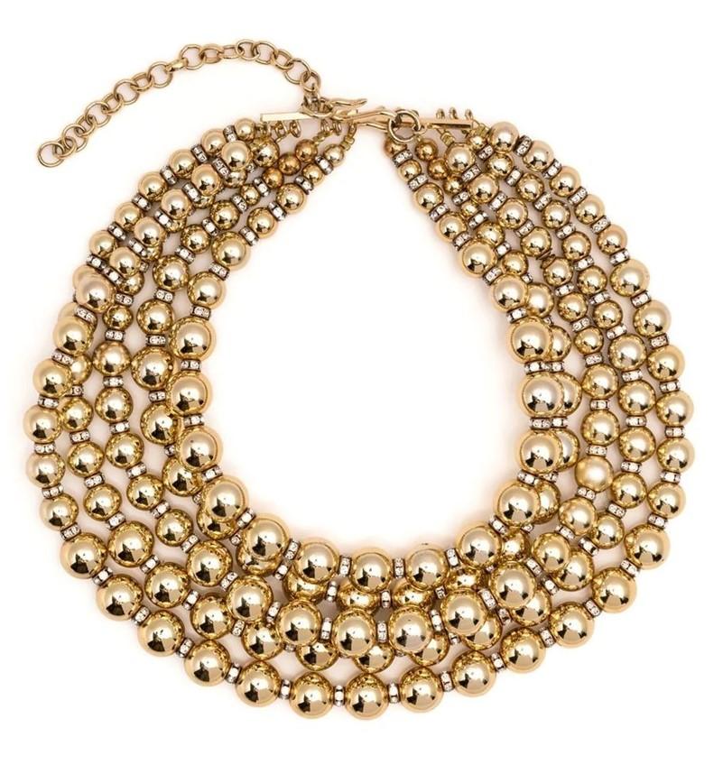 Decorated with bold faux-gold sphere beads and rings of rhinestones, this vintage Dior necklace from circa 1960 has been designed with five layers of balls. Adjust to your desired length using the hook clasp fastening. Pair with the matching ear