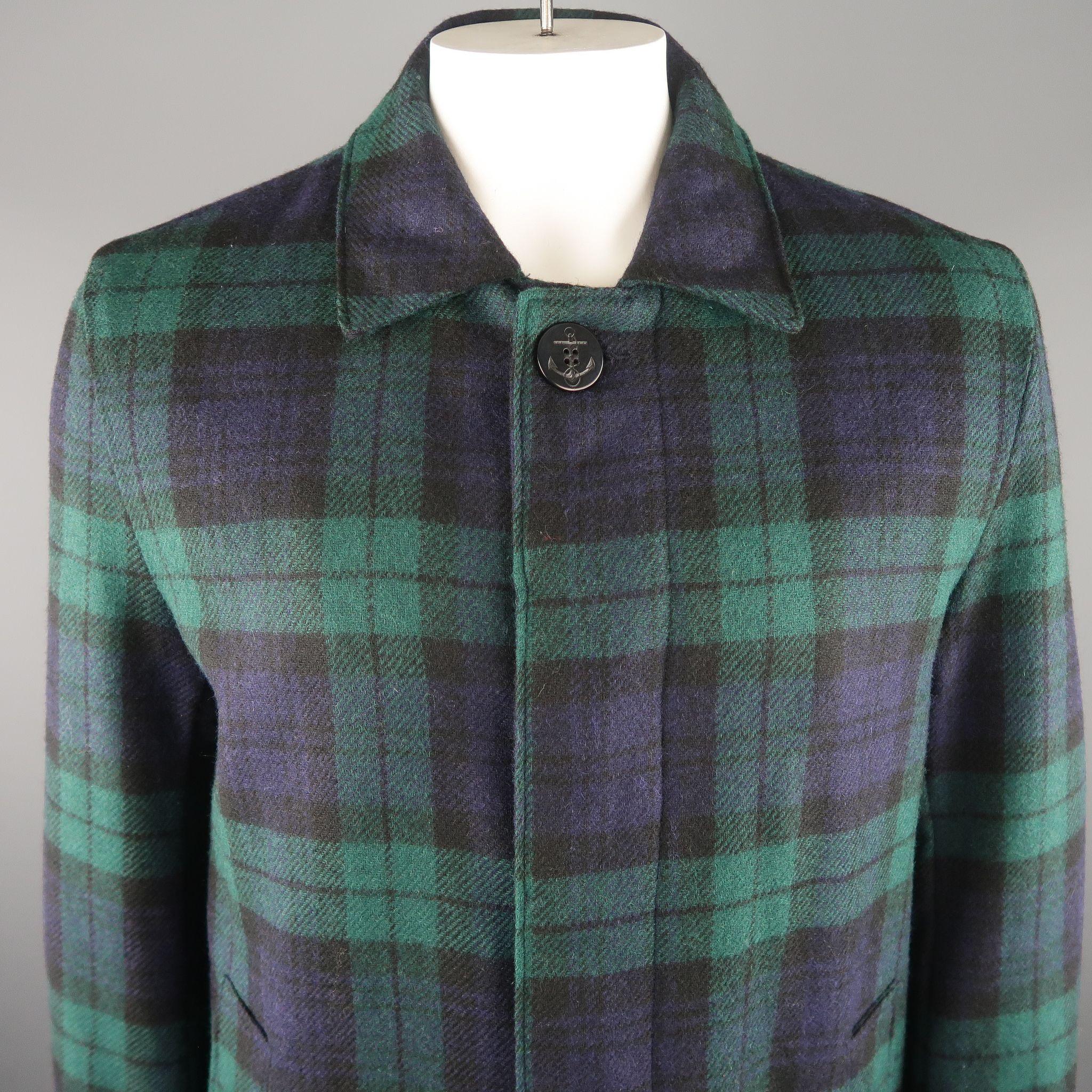 GOLDEN BEAR X UNIONMADE long coat comes in navy and green blackwatch plaid wool material, with hidden buttons, slit pockets and ribbed cuffs. Made in USA.
 
Brand New.
Marked: L
 
Measurements:
 
Shoulder: 18  in.
Chest: 47  in.
Sleeve: 28.5 