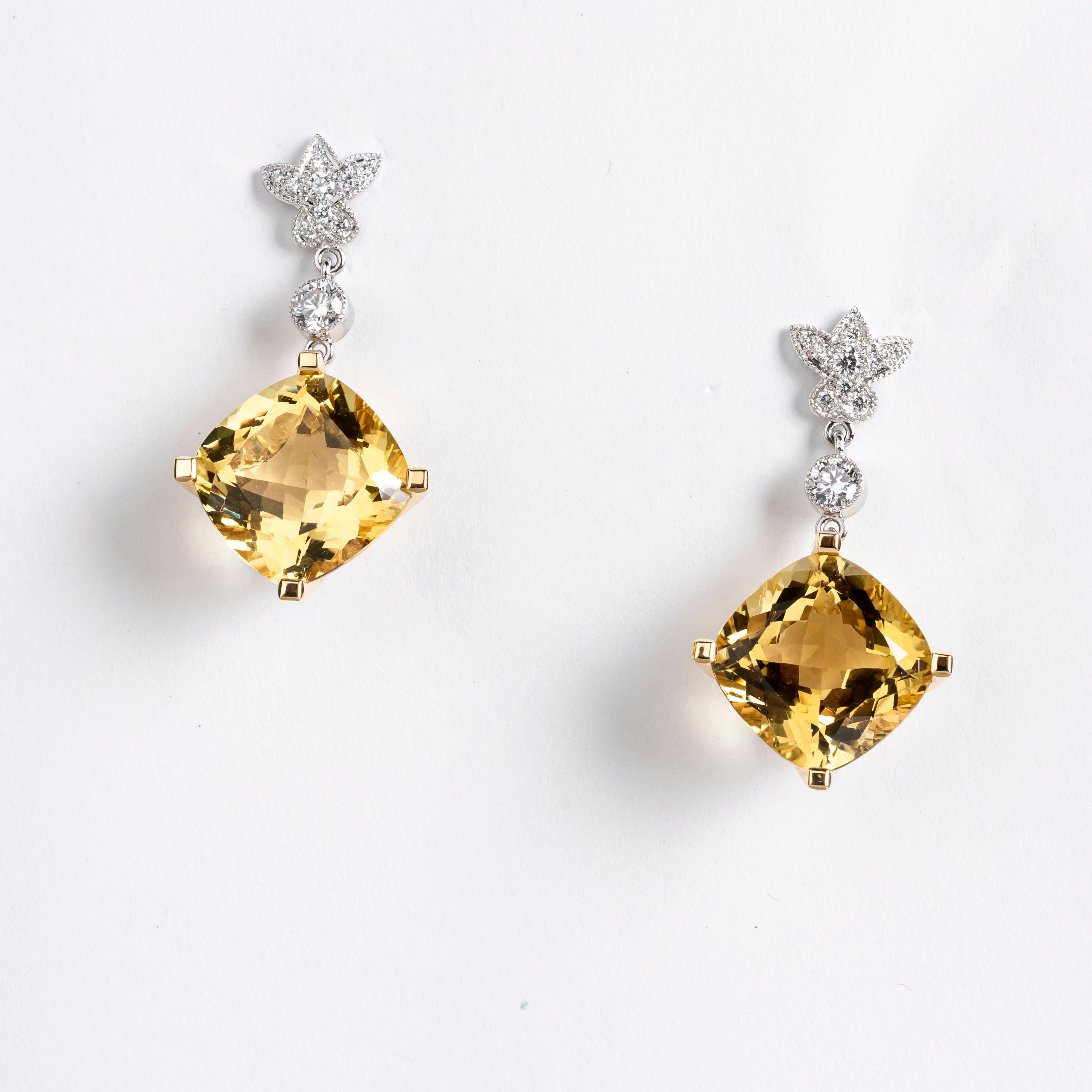 “Lame Collection” natural Golden Beryl and diamond earrings , handcrafted in 18 carat yellow and white gold. Each earring features one 12.5 x 12.5 mm  premium cushion cut Golden Beryl, set on the cross in four squared yellow gold claws. 
The Golden