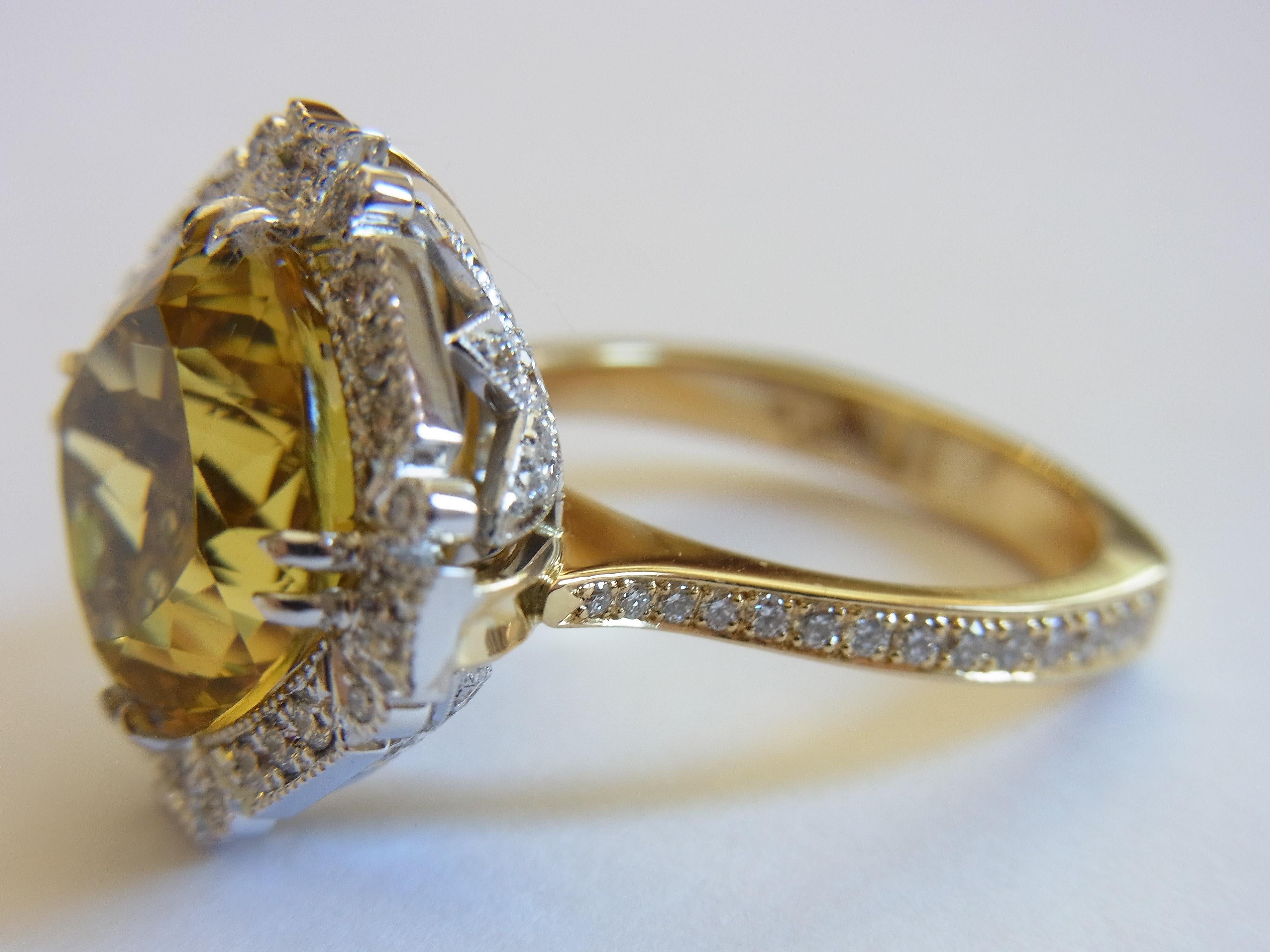 18 carat Golden Beryl and White Diamond Cocktail Engagement Ring

“Lame Collection” natural Golden Beryl and diamond cocktail engagement ring, handcrafted in 18 carat yellow and white gold.
The ring features one 11.5 x 11.5mm premium grade cushion