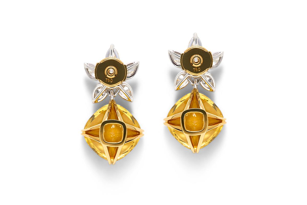 18 Carat Gold Golden Beryl and White Diamond Earrings

Blossom Collection Golden Beryl and Diamond earrings. The Blossom Collection gemstones are a uniquely designed cushion cut, featuring a high table to emulate the antique Georgian style period,