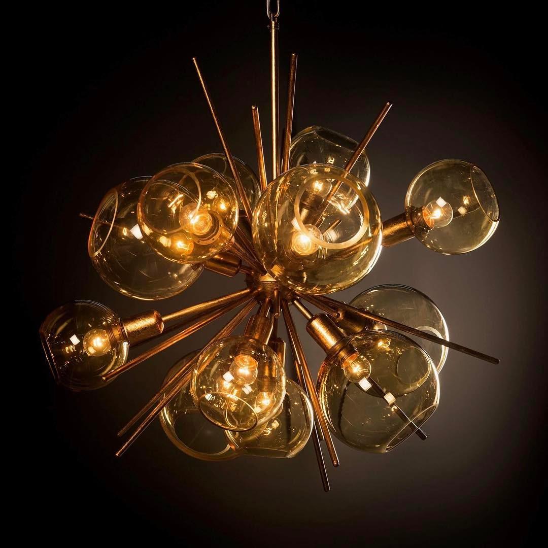 Golden blown glass pendant lamp
Dimensions: Ø 80cm, H 75cm
Lighting: 14 x E27
Possible finishes: Silver leaf, old silver leaf, gold leaf, old gold leaf, copper leaf, rusty, pink golf, brass.
Globes choice: Transparent, milky white,