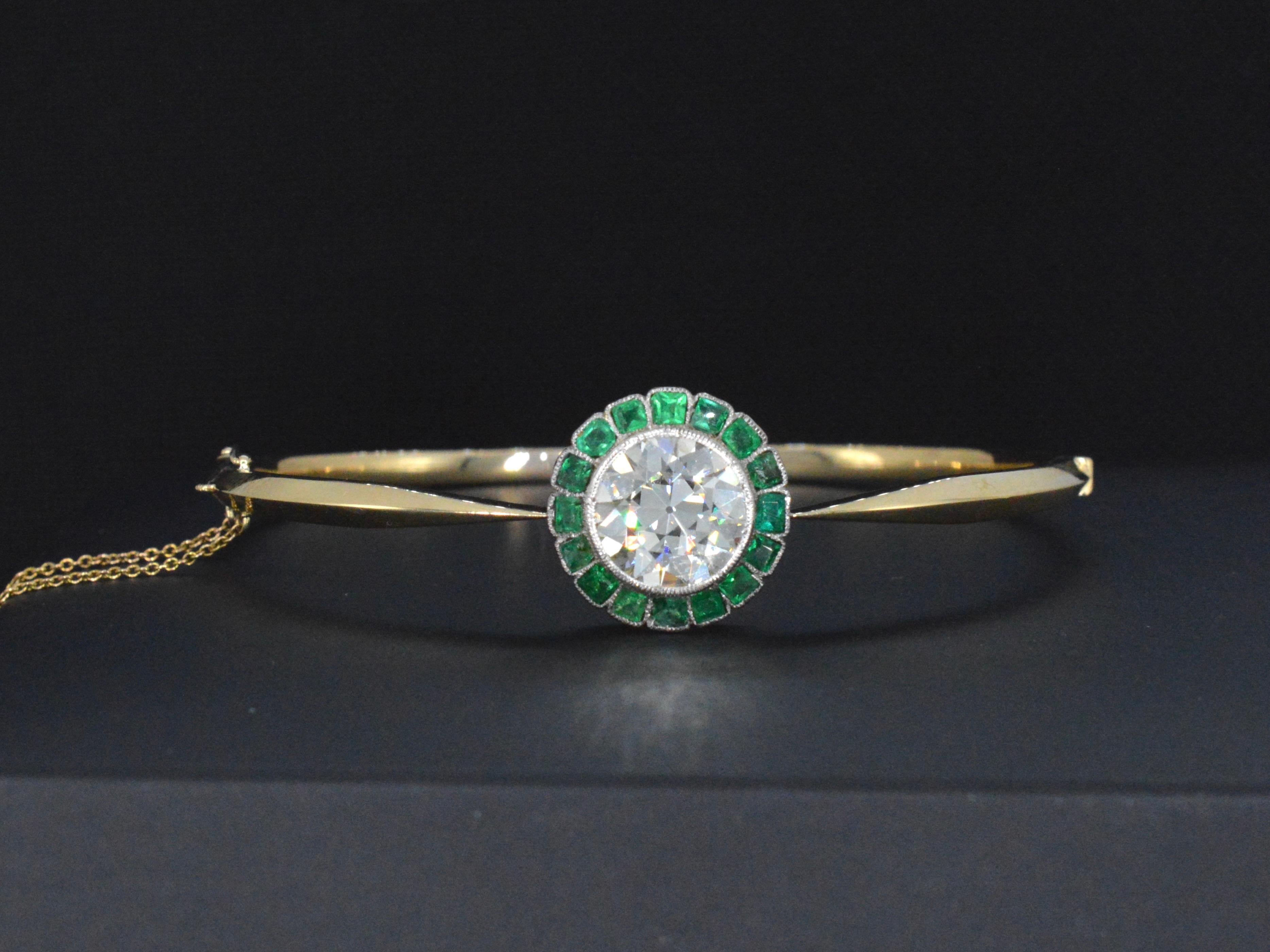 Introducing our extraordinary vintage bracelet, a true masterpiece of elegance and sophistication. This remarkable piece features a breathtaking combination of a 4.50-carat transitional-cut diamond and a 1.50-carat square-cut emerald. The diamond