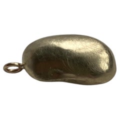 Golden brass kidney bean pendant