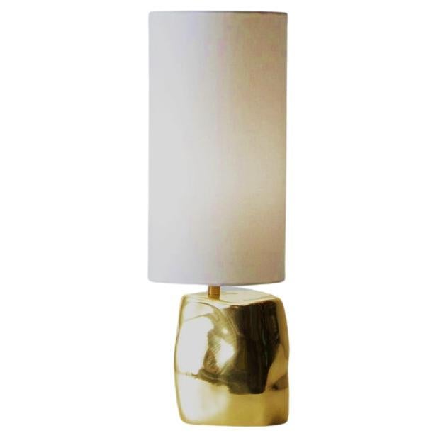 Golden brazilian contemporary table lamp made of cast bronze For Sale