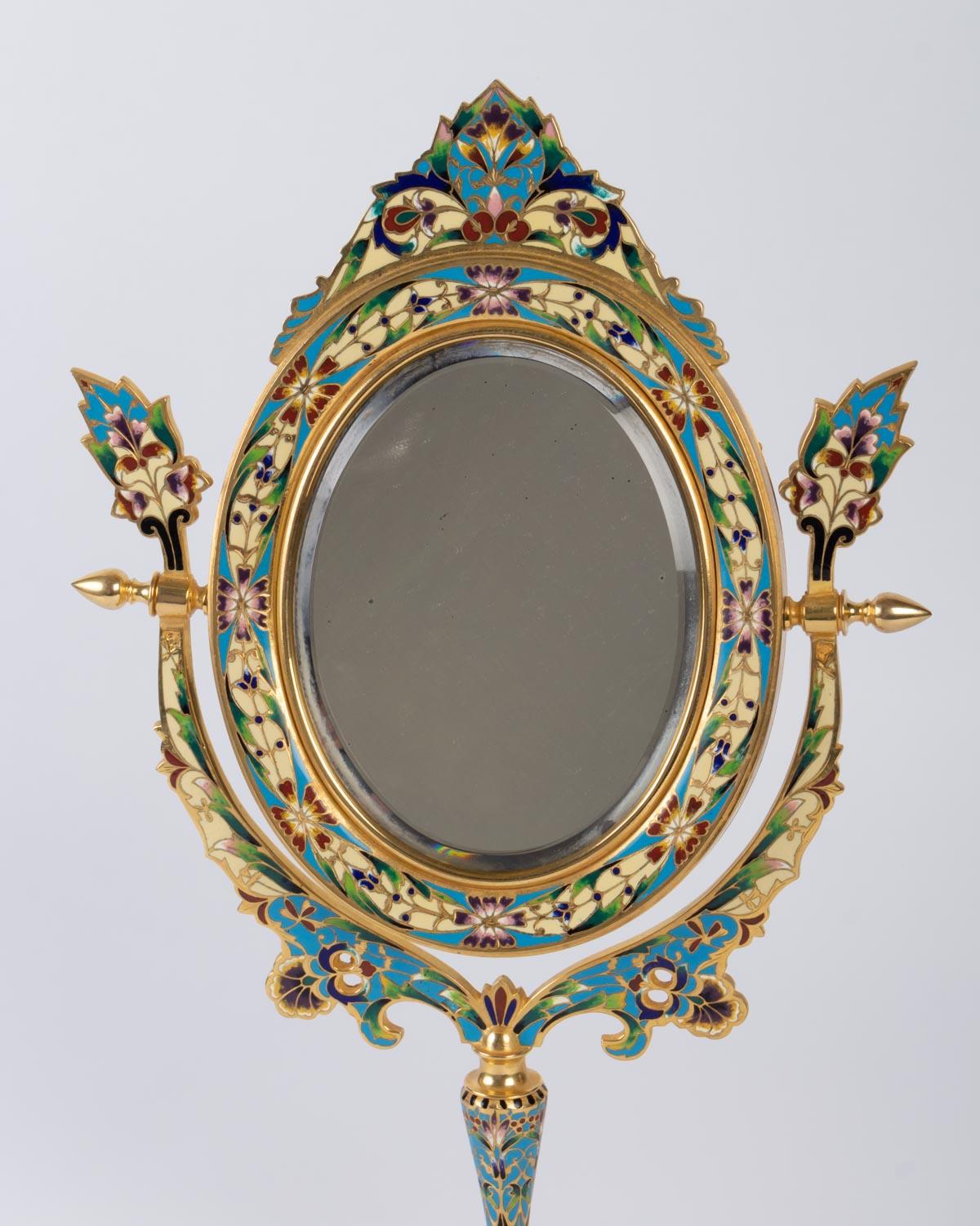 Golden bronze and cloisonné mirror, 19th century, Napoleon III period.

Measures: H 39 cm, W 24 cm, D 12 cm.