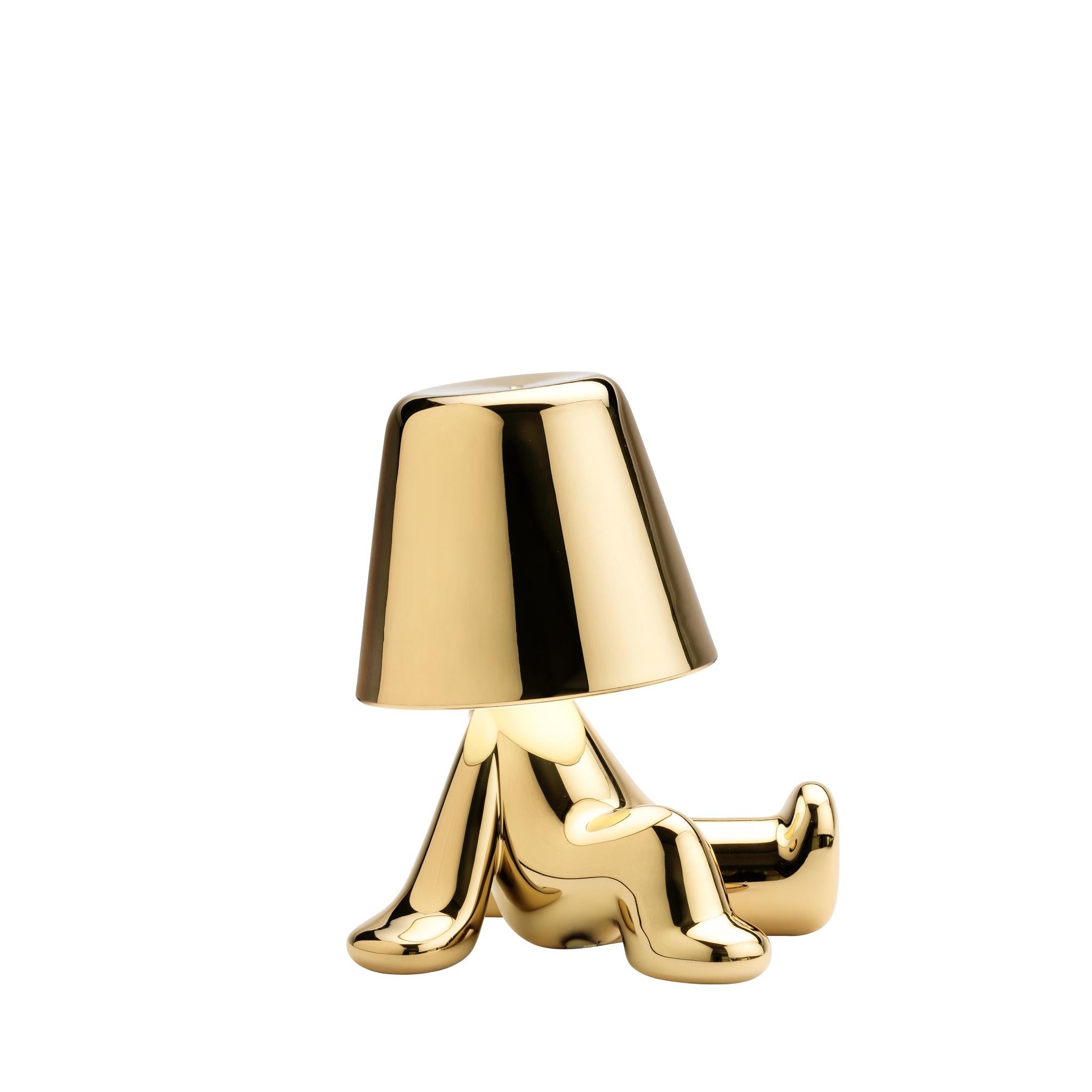 This Golden Brothers is called Bob.

Designed by Stefano Giovannoni, Golden Brothers is a family of lamp-characters which, reflecting a soft light on their body, enhance the plasticity and fluidity of the silhouette. The Golden Brothers, assuming
