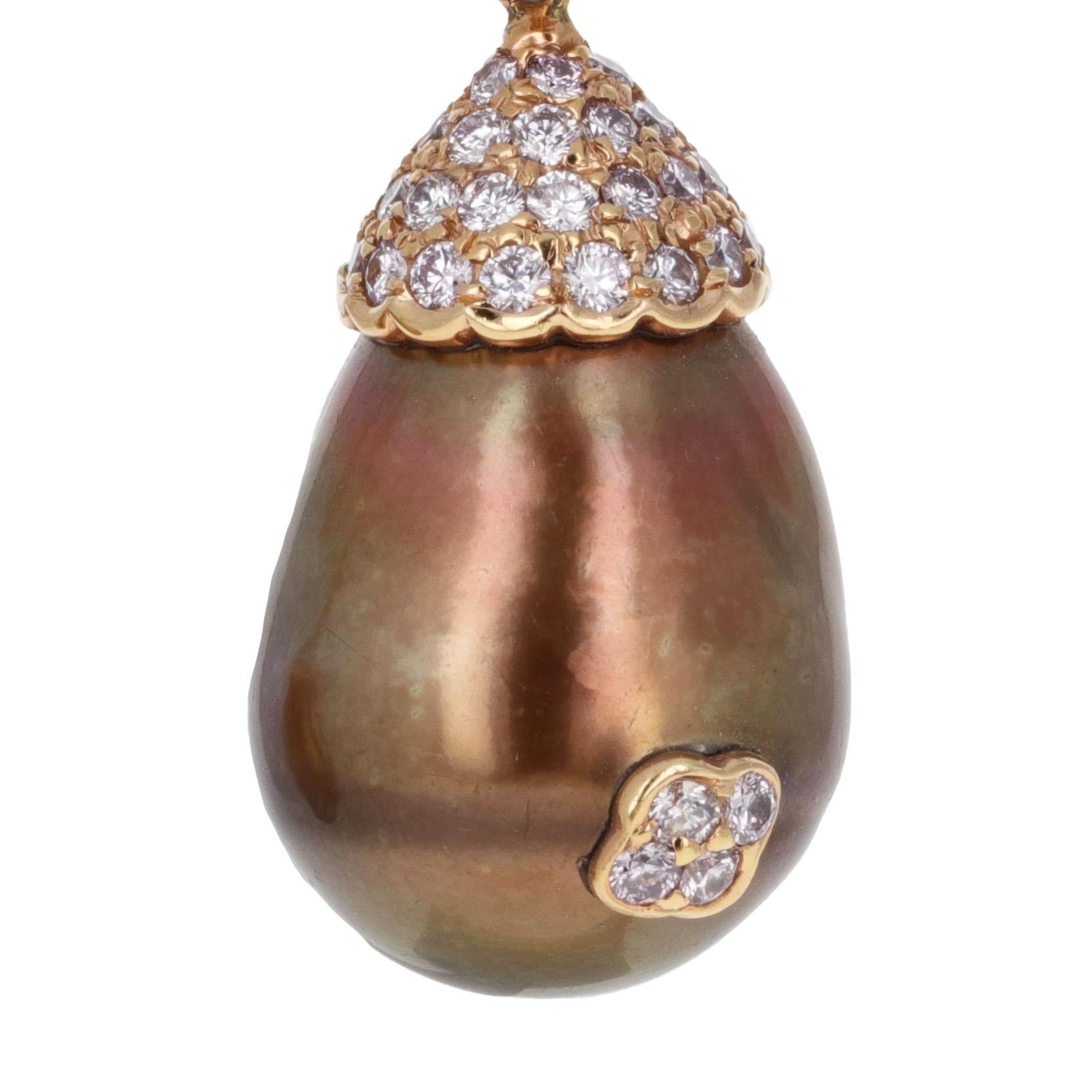 18K rose gold dangle chocolate golden brown pearls with natural pink diamonds. Featuring two luminous chocolate golden brown pearls (14mm) that exude warmth and sophistication, they are elegantly accented by 2.97 carats of sparkling natural pink