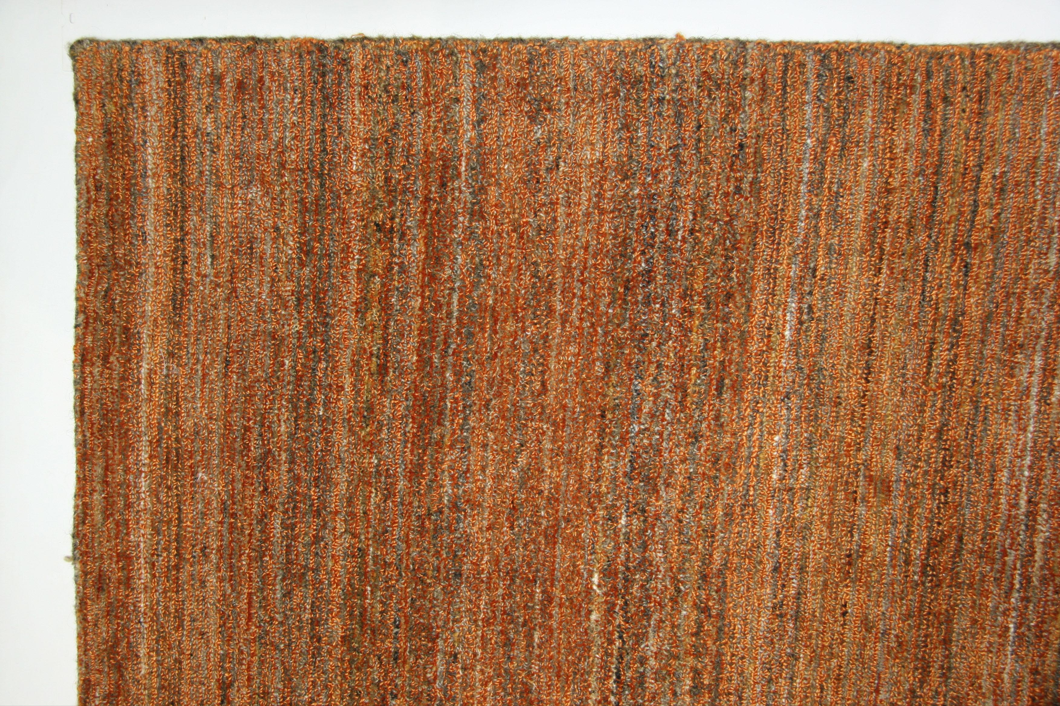 Nubby texture meets warm autumnal colors! Brown/russet/rust/orange/gold tones. Handcrafted in India. Viscose/wool/cotton blend.