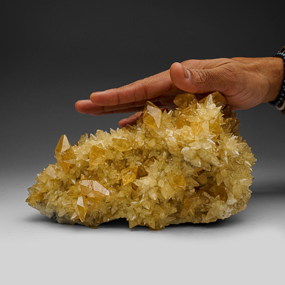 From Elmwood Mine, Carthage, Tennessee

Lustrous transparent deep golden calcite crystals in a stacked cluster. Large double terminated scalenohedral twinned on the C-axis with well defined re-entrant faces. Fully terminated with sharp form and