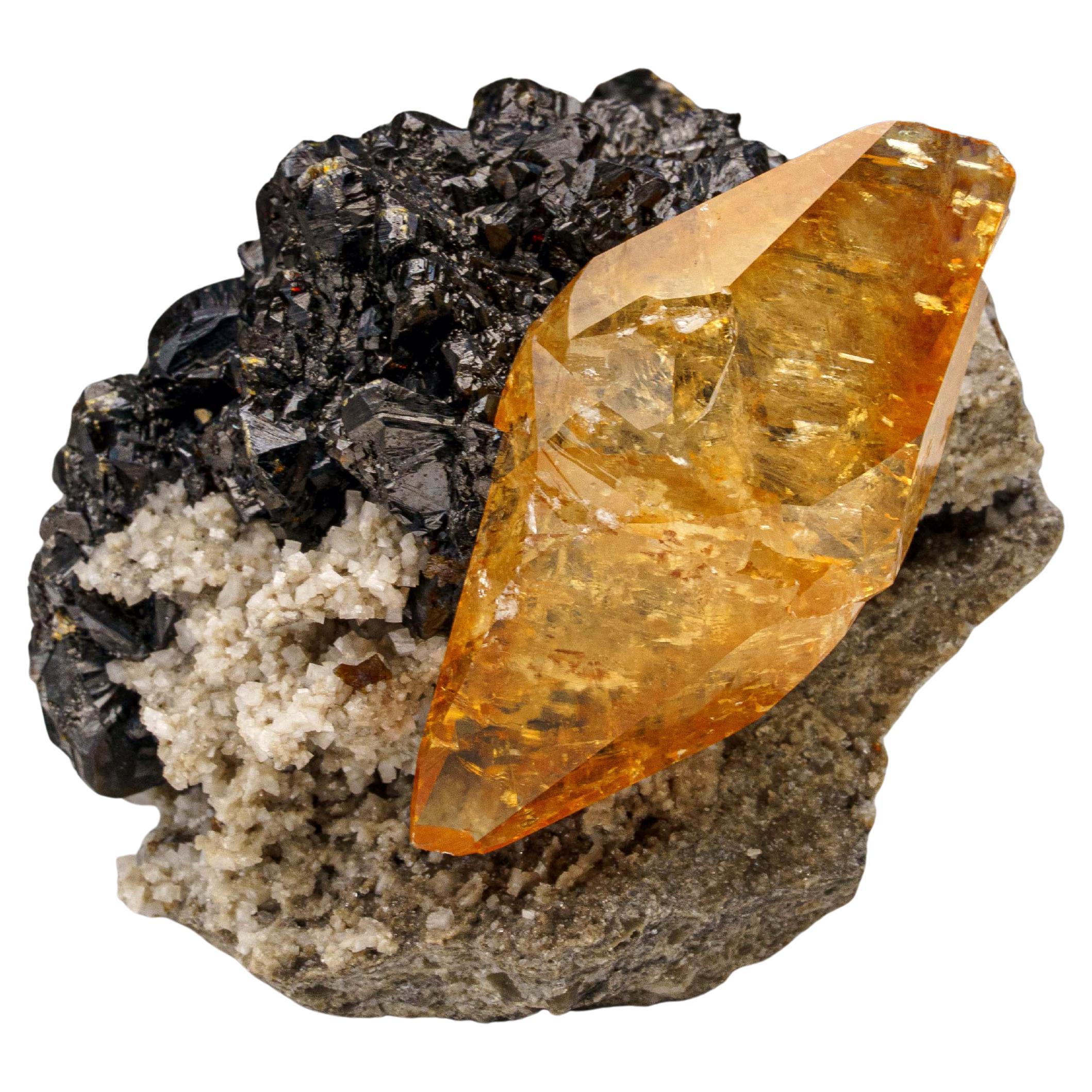 Calcita dorada con cristal de esfalerita de la mina Elmwood, Tennessee