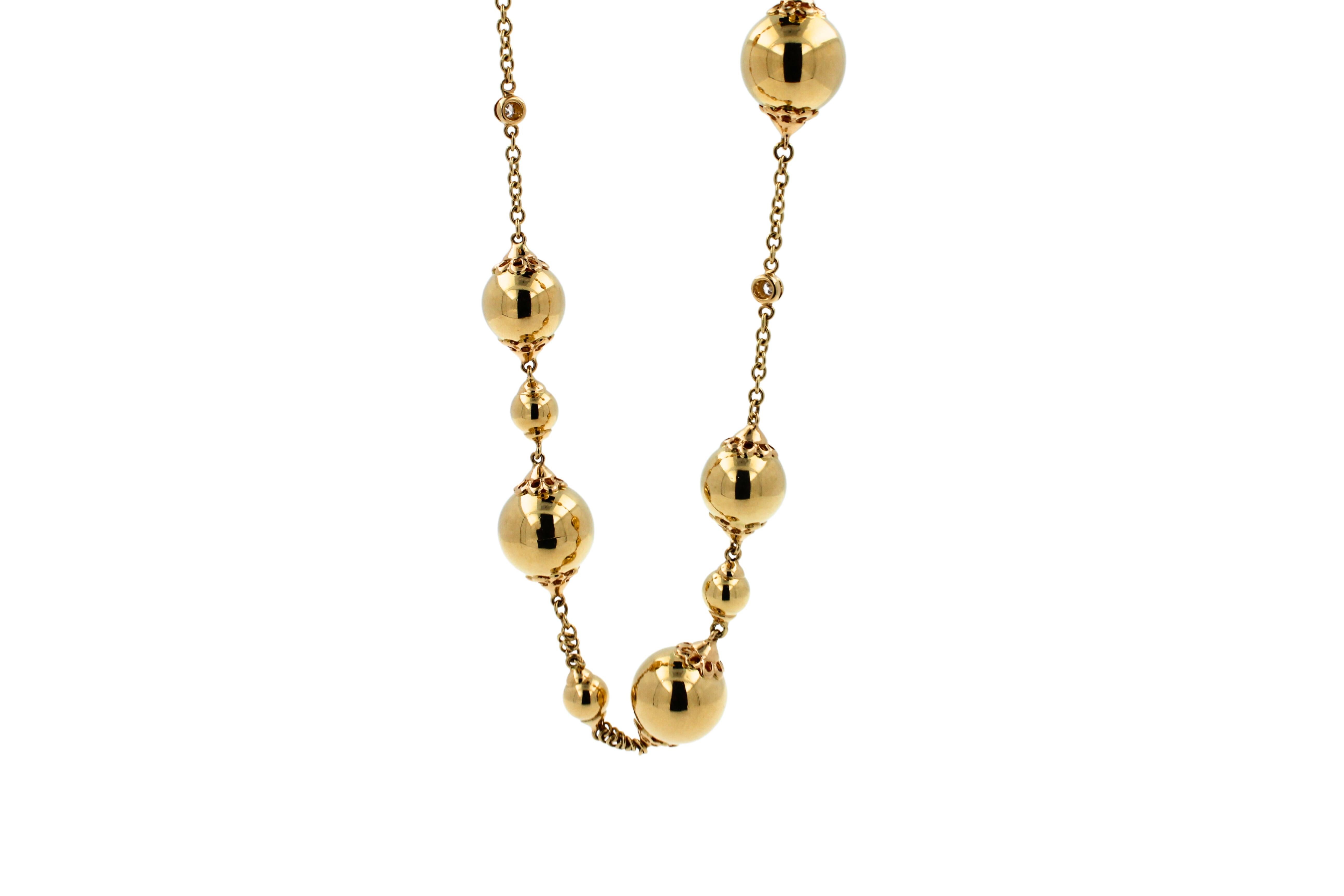 Art déco Long collier en or jaune 18 carats avec sphères célestes et diamants en vente