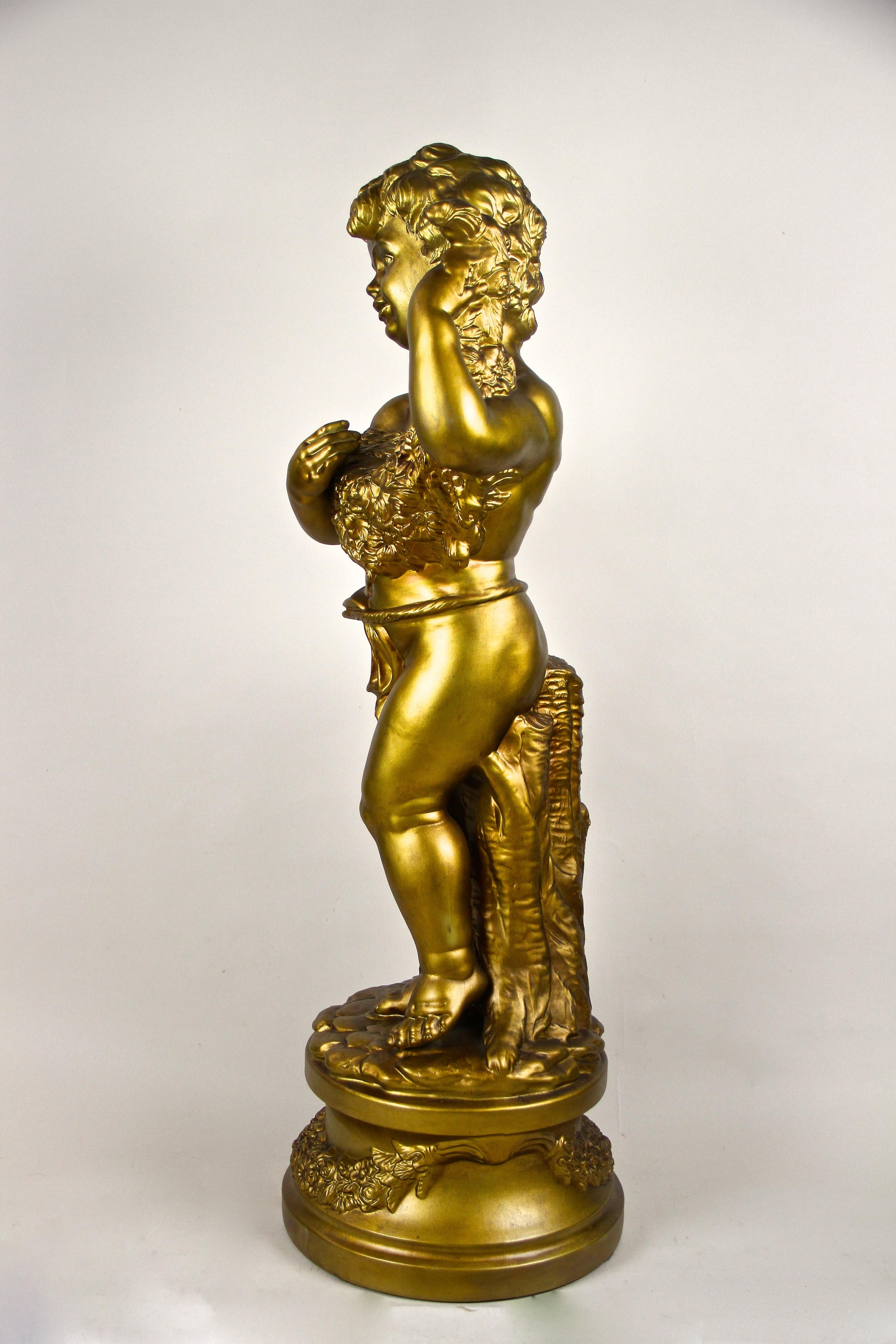 Gilt Golden Ceramic Sculpture Putto with Bouquet of Flowers, Austria, circa 1930