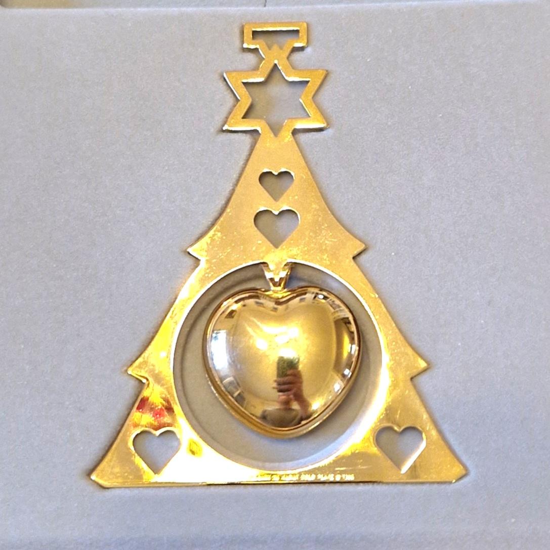 Every year a well-known Danish artist designs the Georg Jensen Christmas Ornament. In its many incarnations over the years it has become a tradition representative of Danish handcrafts - and a much-loved decorations in many homes. 
Artist Sven