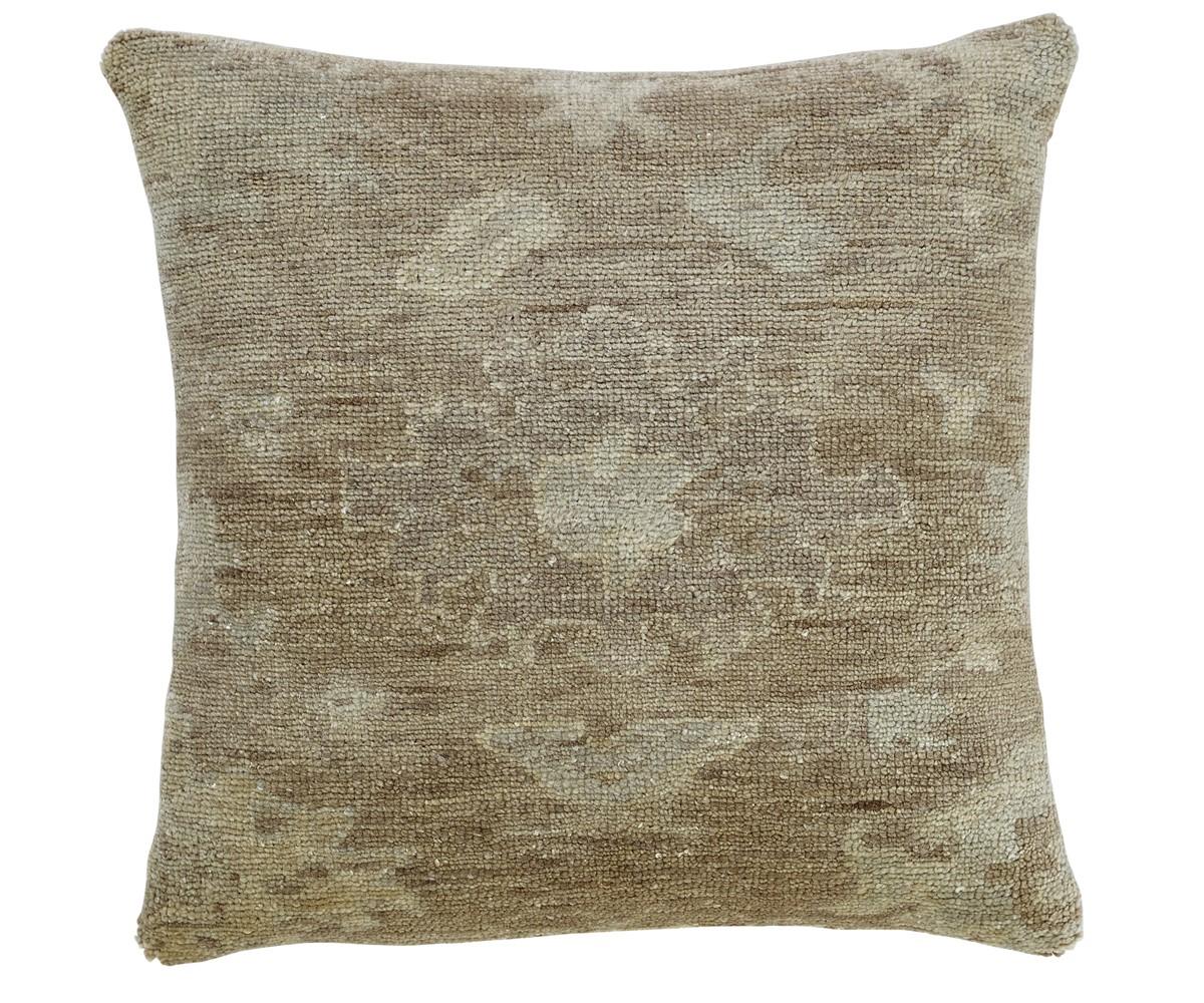 This new accent pillow of East-meets-West design aesthetic showcases a floral design with predominant golden/coffee color. 

Hand made, using either 100% premium wool.

This pillow measure: 22