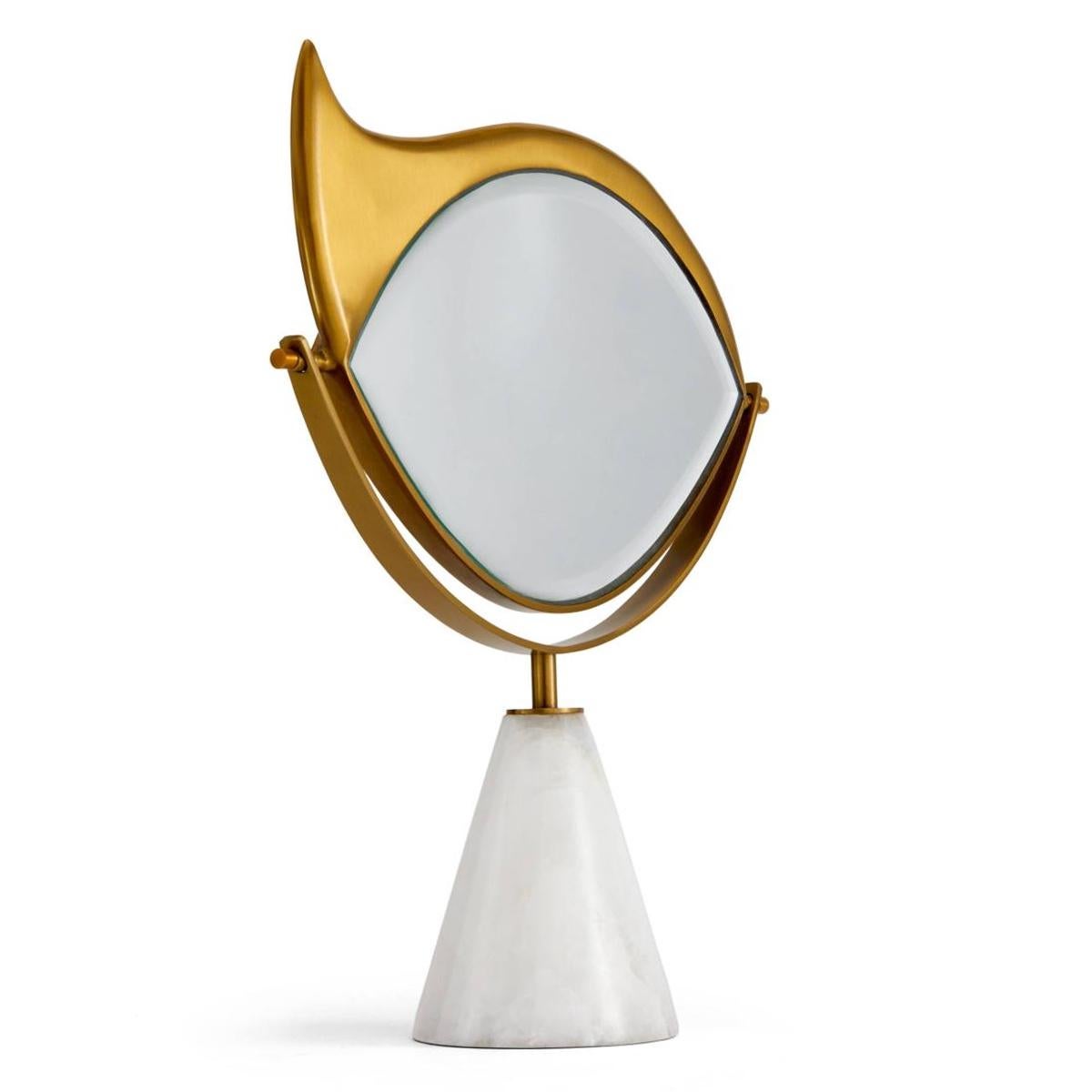 Mirror golden eye coiffeuse with solid brass structure
in 24-karat and white marble base. With reclining beveled
glass mirror.