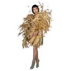 Golden feather musical boa 1990s