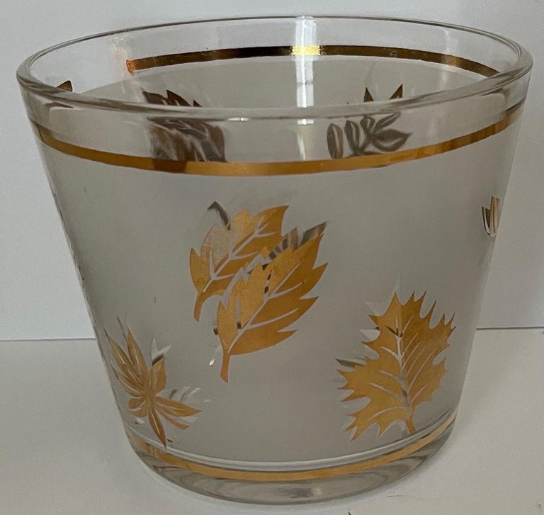 https://a.1stdibscdn.com/golden-foliage-leaf-highball-glasses-set-of-8-and-ice-bucket-by-libby-glass-for-sale-picture-3/f_18603/1671905366832/mobilejpegupload_567A47ED72BB441A9B26050ADED9000C_master.jpg?width=768
