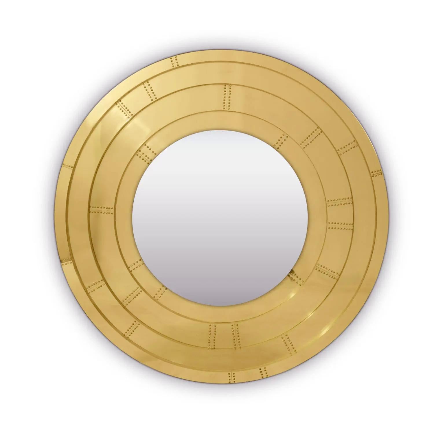 Miroir porte d'or avec cadre en laiton massif poli
avec des clous rivetés inclus dans le cadre. Avec miroir rond
entouré de bandes lumineuses à Led. Pièce exceptionnelle.