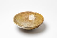 Golden glazed ceramic cup with metallic highlights by Gisèle Buthod Garçon, 1990