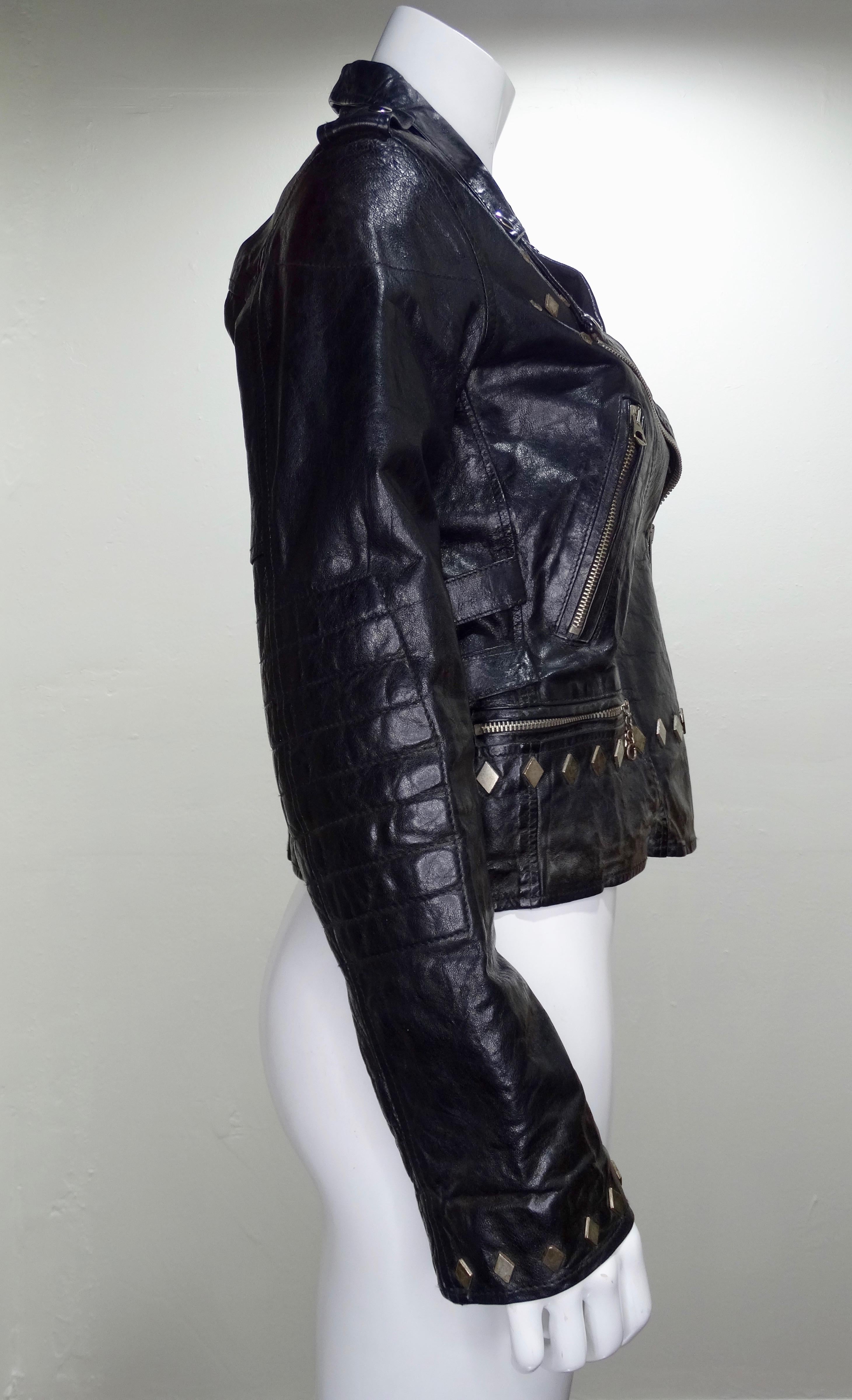 Everyone needs a great leather jacket in their closet! Circa recent 2000s, this motorcycle jacket features Golden Goose's signature distressed leather with gunmetal hardware, diamond shaped studs, notched lapel, a zip and press stud fastening,