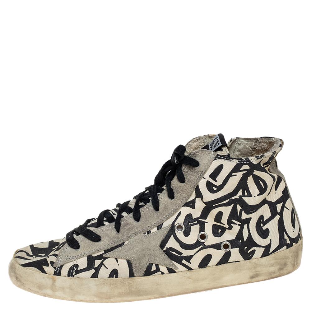 These stylish and comfortable Francy sneakers come from the house of Golden Goose. Crafted in Italy, they are made of quality printed canvas and suede. They flaunt star appliques, lace-up fronts, eyelets on the sides, fabric lining, leather insoles,