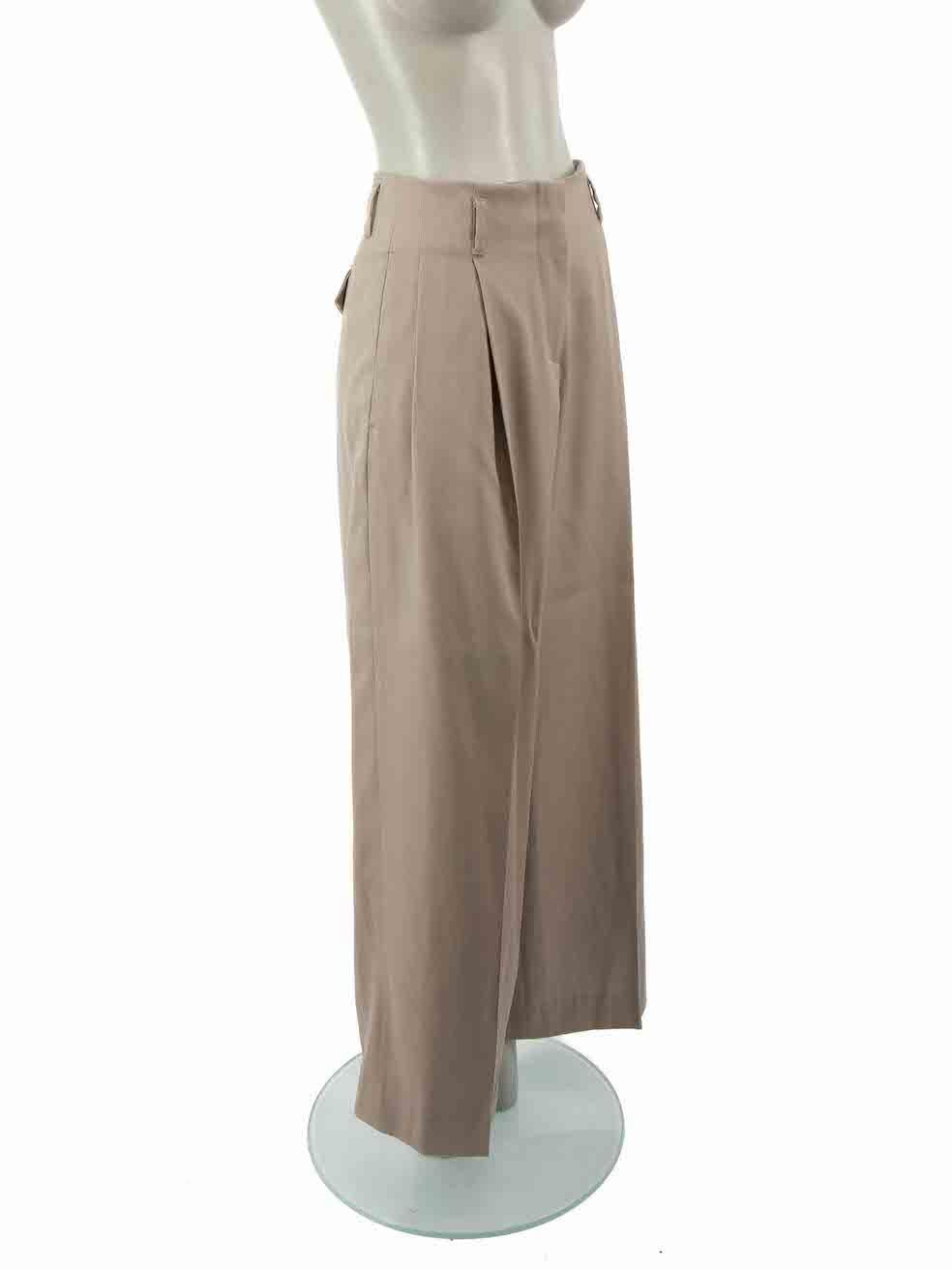 CONDITION is Never worn. No visible wear to trousers is evident on this new Golden Goose designer resale item.
 
Details
Beige
Wool
Wide leg trousers
High rise
Front zip closure with clasp and button
Belt hoops
2x Front side pockets
2x Back pockets