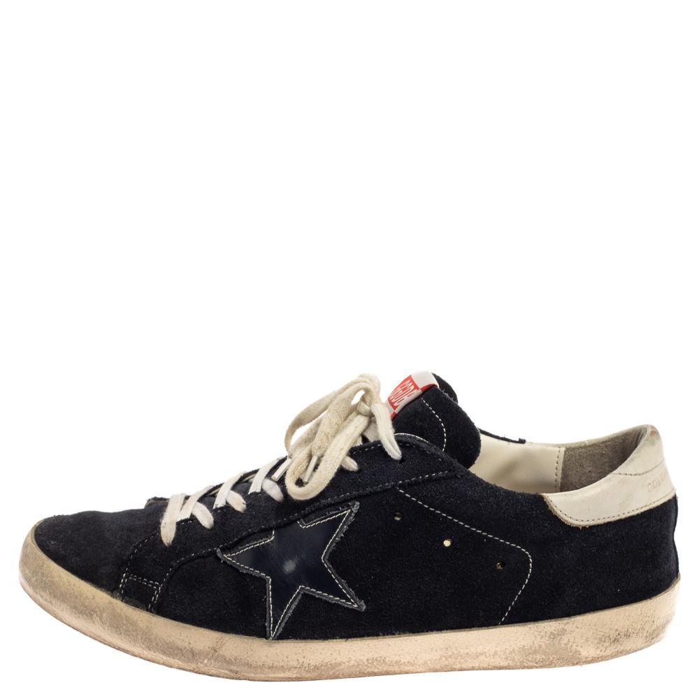 Enjoy footwear ease with this pair of sneakers by Golden Goose. They've been crafted from blue suede and designed with round toes, star patches, and lace-up on the vamps. The leather insoles and rubber soles add to the comfort of the pair.

