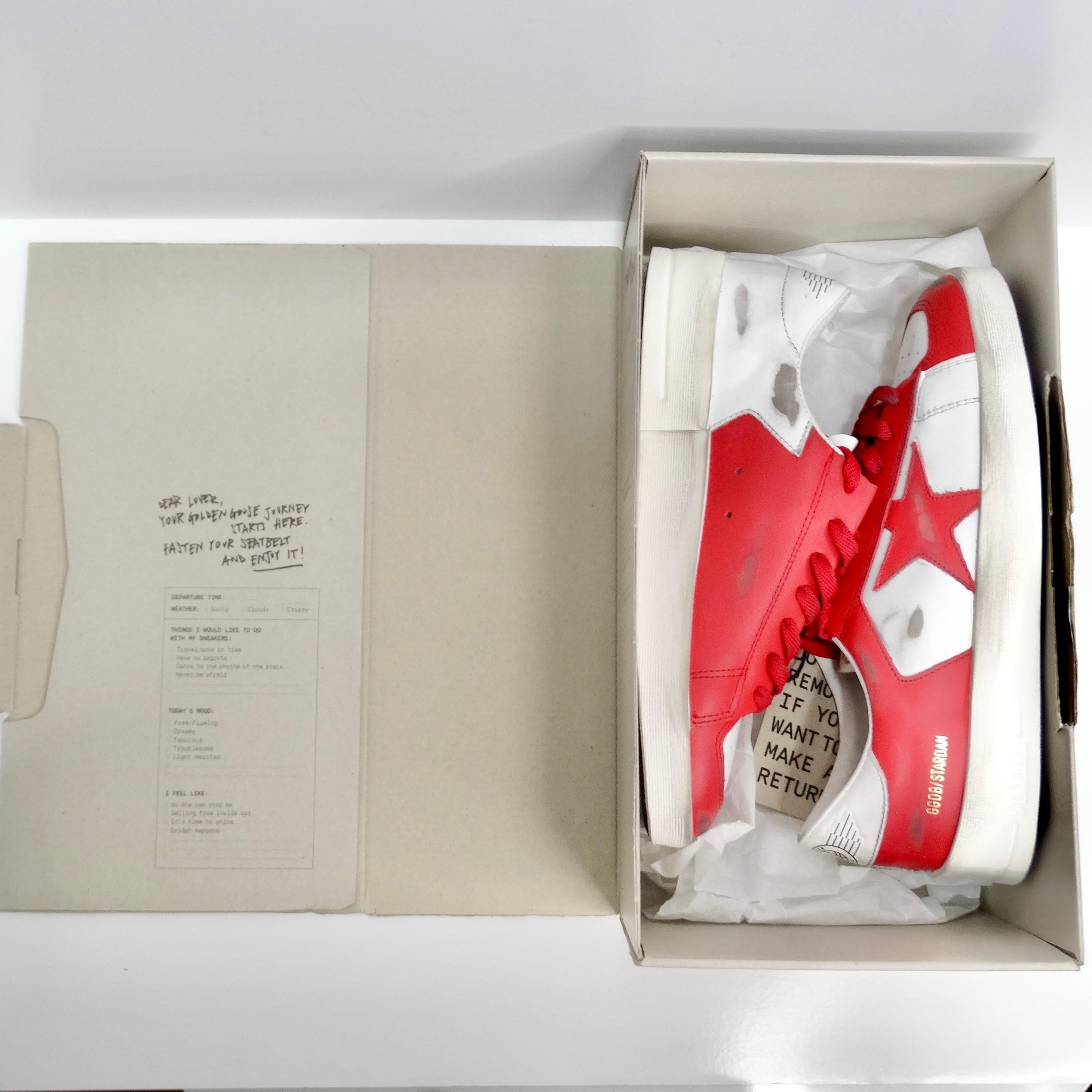 Introducing the Golden Goose Brand New Stardan Leather Sneakers in Red, a vintage-inspired release from the renowned Italian label. Crafted with meticulous attention to detail, these sneakers boast a timeless design that effortlessly blends retro