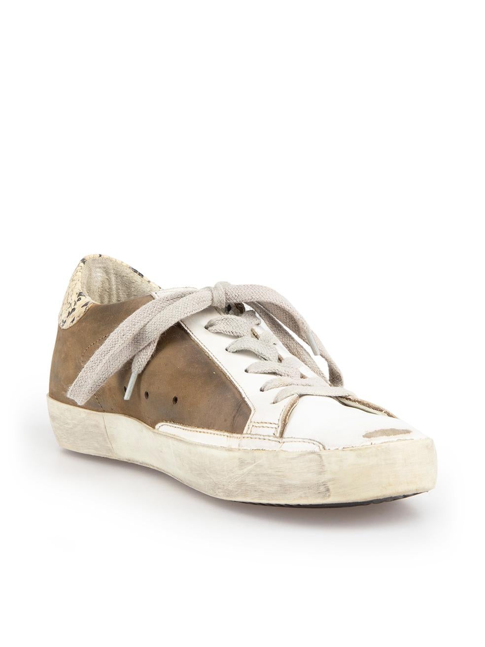 CONDITION is Very good. Minimal wear to trainer is evident, minor creasing on uppers on this used Golden Goose designer resale item. Please note that these shoes are purposely distressed.
 
 
 
 Details
 
 
 Model: Superstar
 
 Brown
 
 Suede
 
 Low