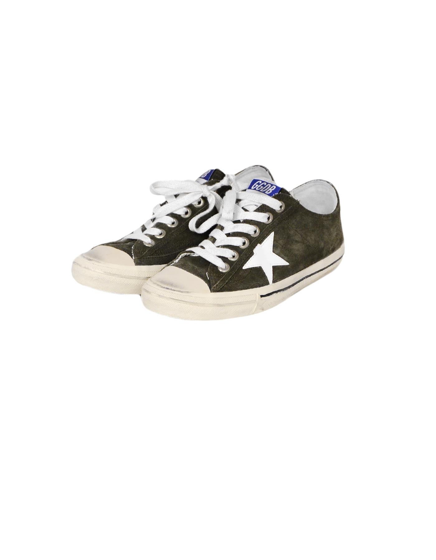 Golden Goose Deluxe Brand Military Green Suede V-Star Distressed Sneakers sz 41

Made In: Italy
Color: Grey, Military Green, White
Hardware: Silvertone
Materials: Suede
Closure/Opening: Lace-up
Overall Condition: Excellent pre-owned condition