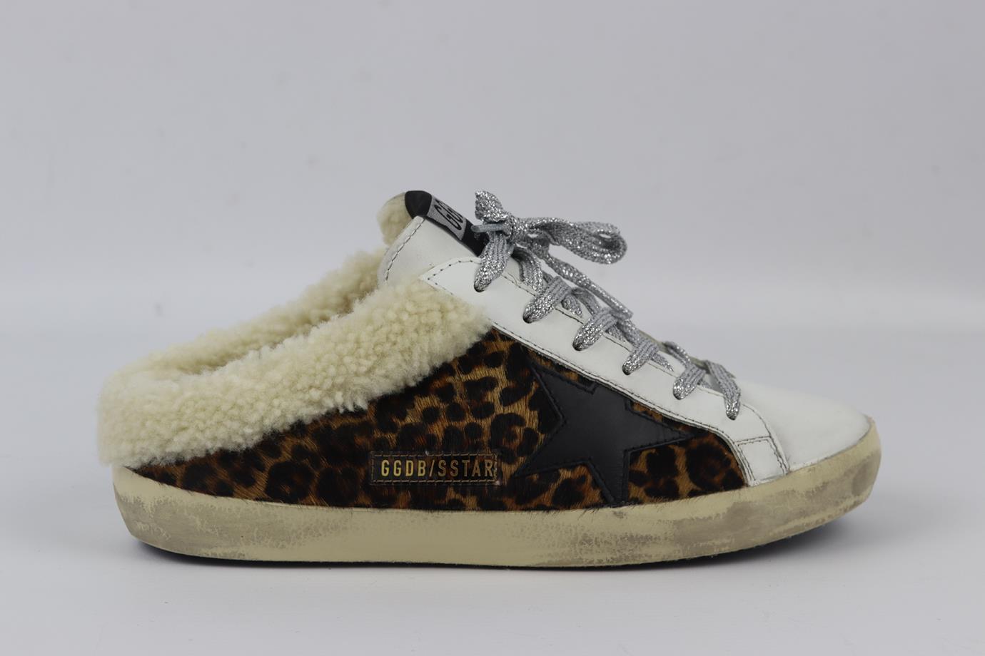 Golden Goose Deluxe Brand Sabot shearling lined shearling slip on sneakers. White, cream, brown, black and silver. Slips on. Does not come with dustbag or box. Size: EU 38 (UK 5, US 8). Insole: 9.75 in. Heel Height: 1.5 in. Very good condition -