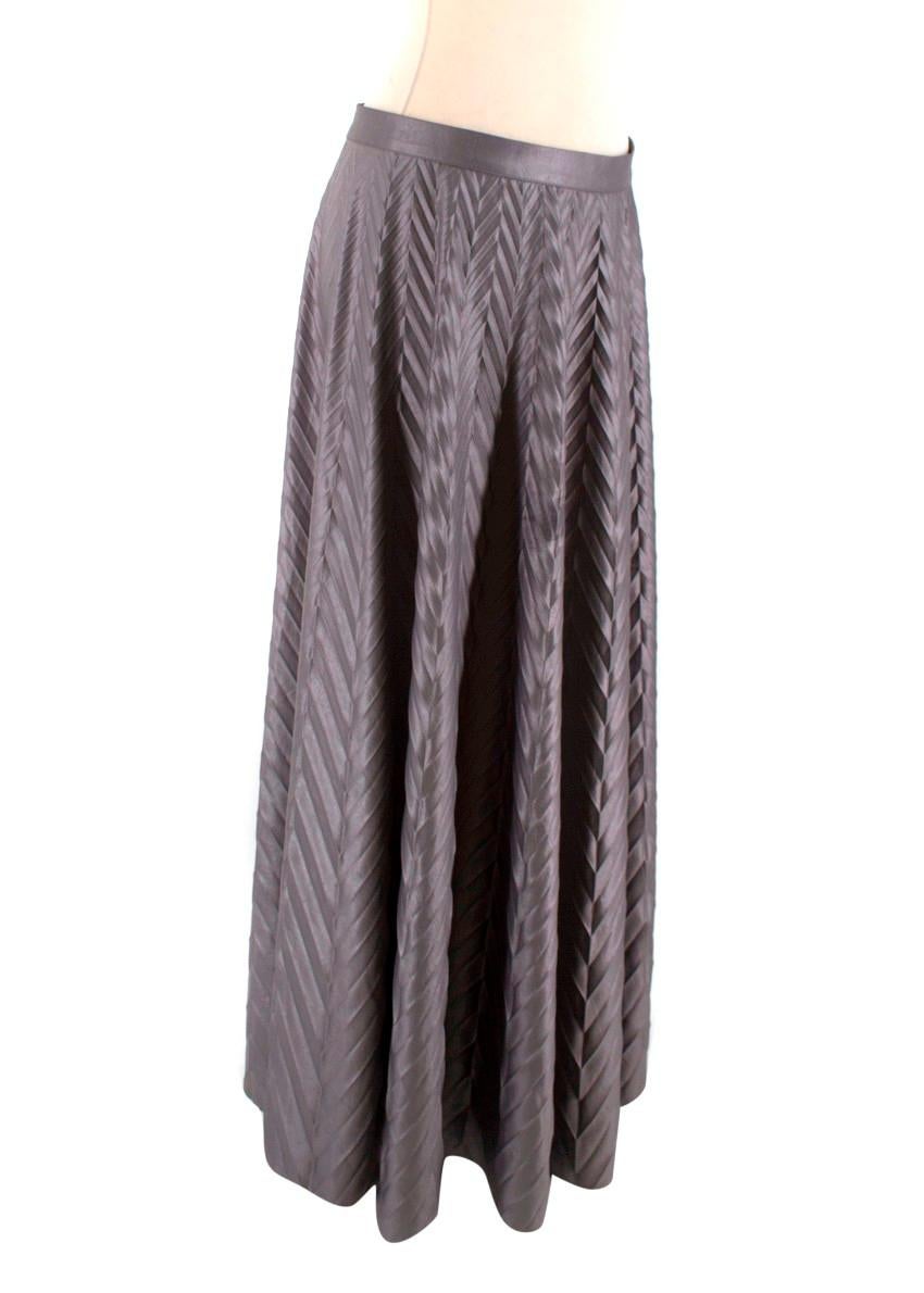 Golden Goose Deluxe Brand Silver Maxi Skirt

-Silver maxi skirt with chevron pleating
-A line skirt
-Back concealed zip closure

Please note, these items are pre-owned and may show signs of being stored even when unworn and unused. This is reflected