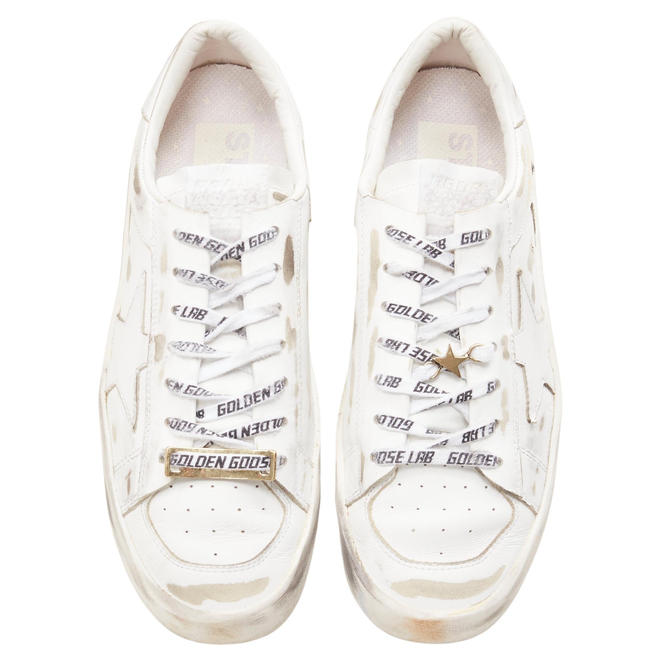GOLDEN GOOSE GG/AFG Stardan distressed white low top sneaker EU38
Brand: Golden Goose
Model: GGDB/AFG

CONDITION:
Condition: Excellent, this item was pre-owned and is in excellent condition. 

SIZING:
Designer Size: EU 38

This Golden Goose item is