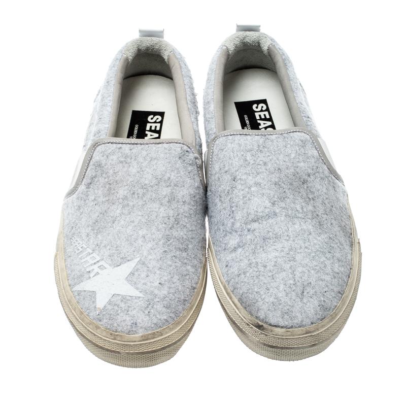 Enjoy footwear ease with this pair of grey sneakers by Golden Goose. They've been crafted from wool fabric and designed with round toes and leather insoles. They are easy to slip on and off.

Includes: The Luxury Closet Packaging

