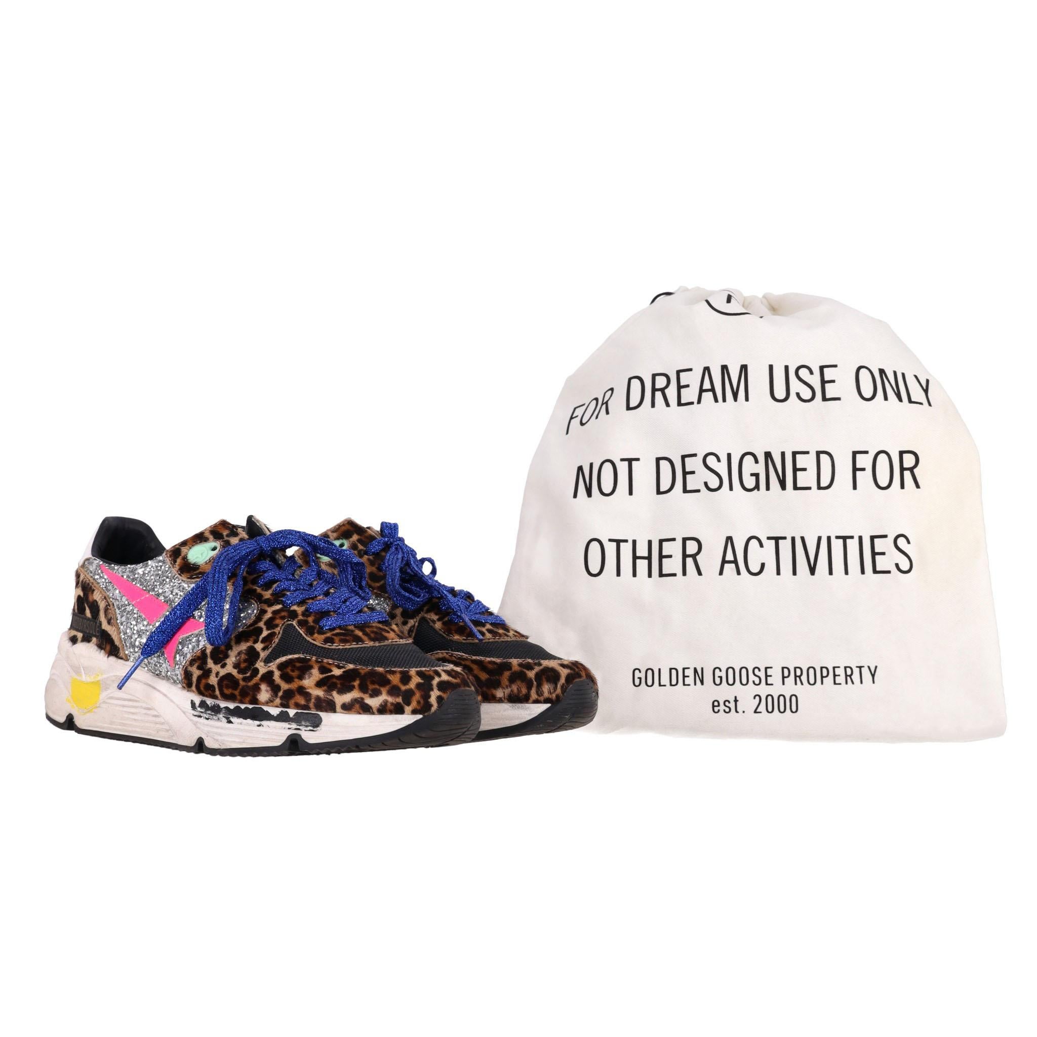 Golden Goose Leopard Print Running Sole Sneakers

Multicolour leather sneakers with sparkling glitter and leopard print inserts.

Featuring signature star patch to the sides, contrasting heel counter, round toe, front lace-up fastening and rubber