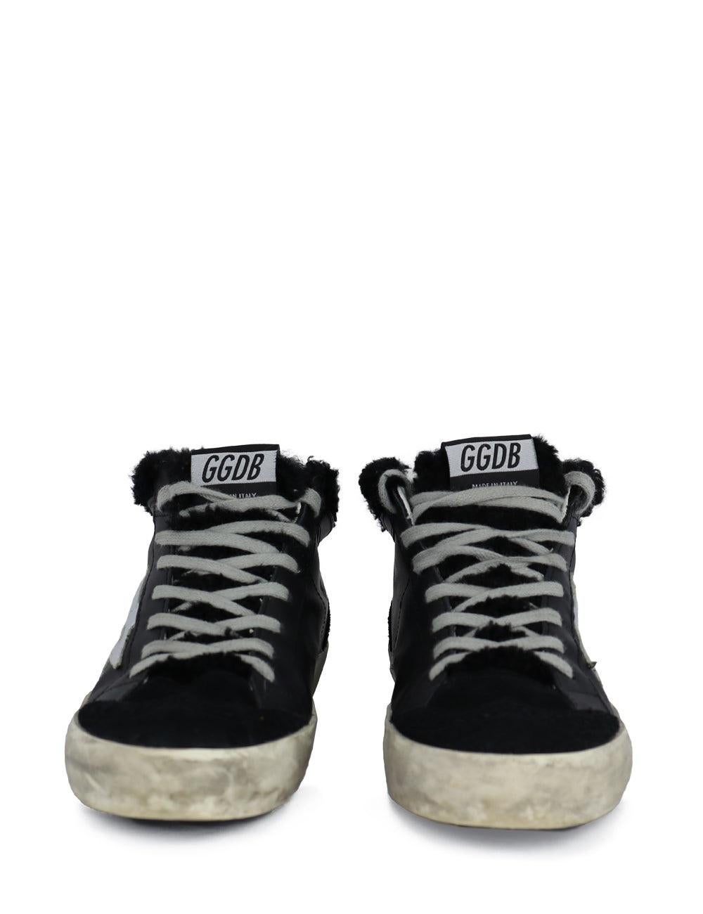Golden Goose Mid Star shearling-lined distressed leather and suede sneakers, with a signature metallic star at the side and the shearling collar.

Additional information:
Material: Suede and Leather
Size: EU 37
Overall Condition: Very Good
Interior