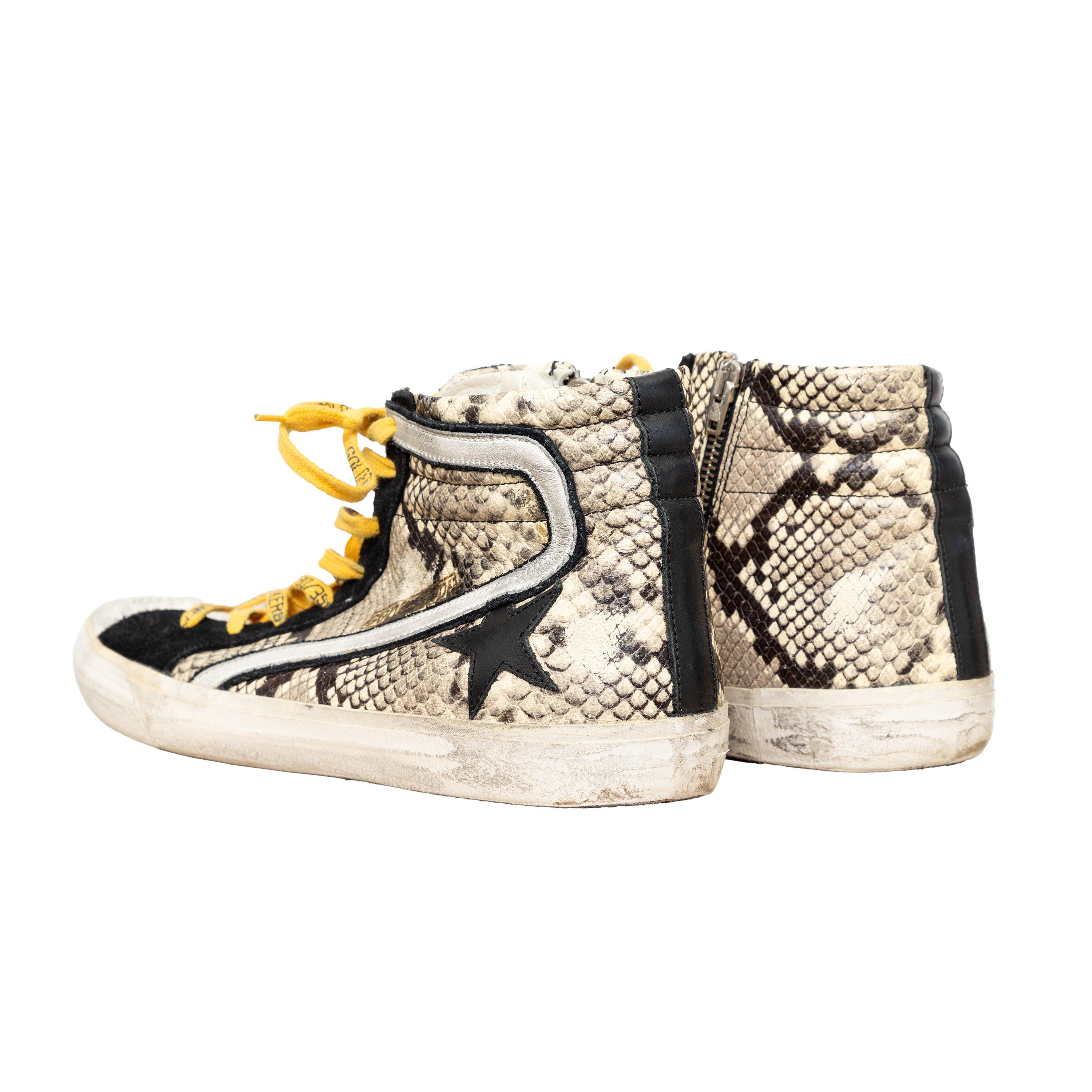 Golden Goose High Top sneakers with distressed faded design, printed snakeskin leather, and yellow lace-up with brand emblem for a bold street style. 
 Measurement: Insole Length:29.5;Heel:3 
 Material: Leather