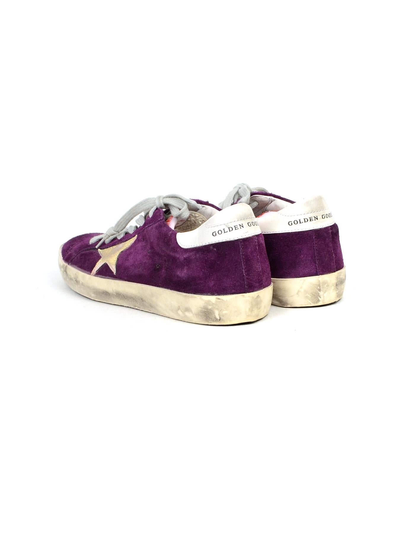 purple and gold sneakers