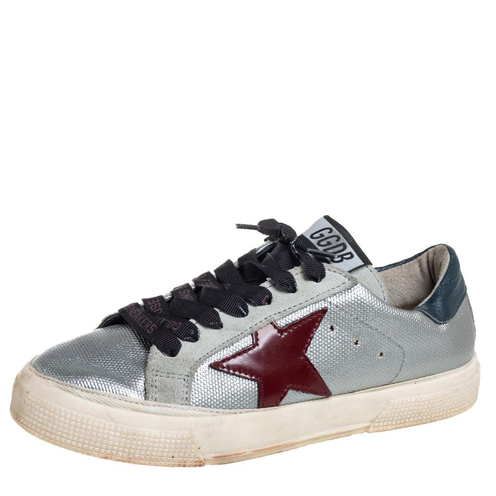 Founded in 2000, Golden Goose is hailed for meticulous craftsmanship in shoemaking and creative designs fused with a vintage appeal. Made from suede and leather, they feature a distressed finish, laces on the vamps, and their signature star motifs