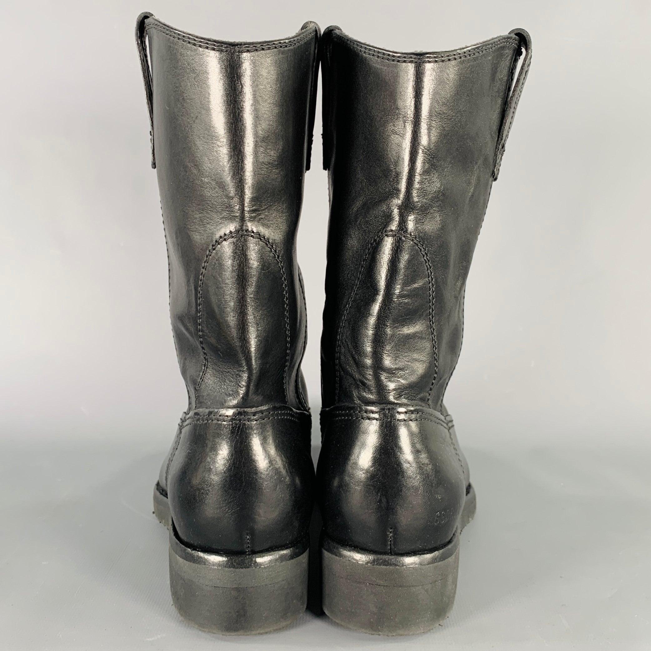 GOLDEN GOOSE boots
in a black leather featuring a Western cowboy boots style, rubber sole, and pull on closure. Handmade in Italy.Excellent Pre-Owned Condition. 

Marked:   IT 37 

Measurements: 
  Length: 10.25 inches Width: 3.75 inches Height: 10