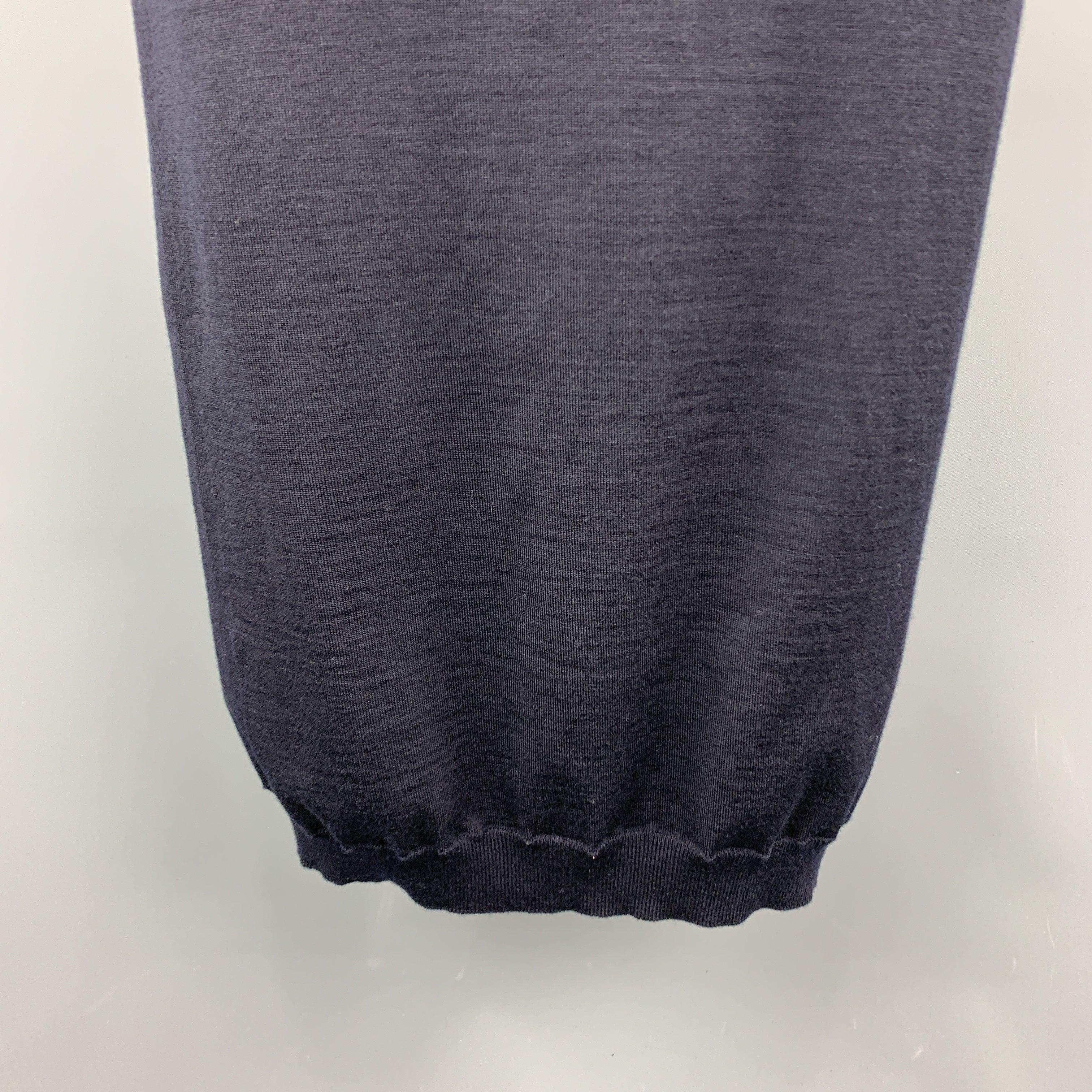 GOLDEN GOOSE skirt comes in navy merino wool blend stretch knit with a pencil silhouette. Made in Italy.
Excellent Pre-Owned Condition.
 

Marked:   M
 

Measurements: 
  
l	Waist: 26 inches 
l	Hip: 32 inches 
l	Length: 33 inches 

  
  
  
