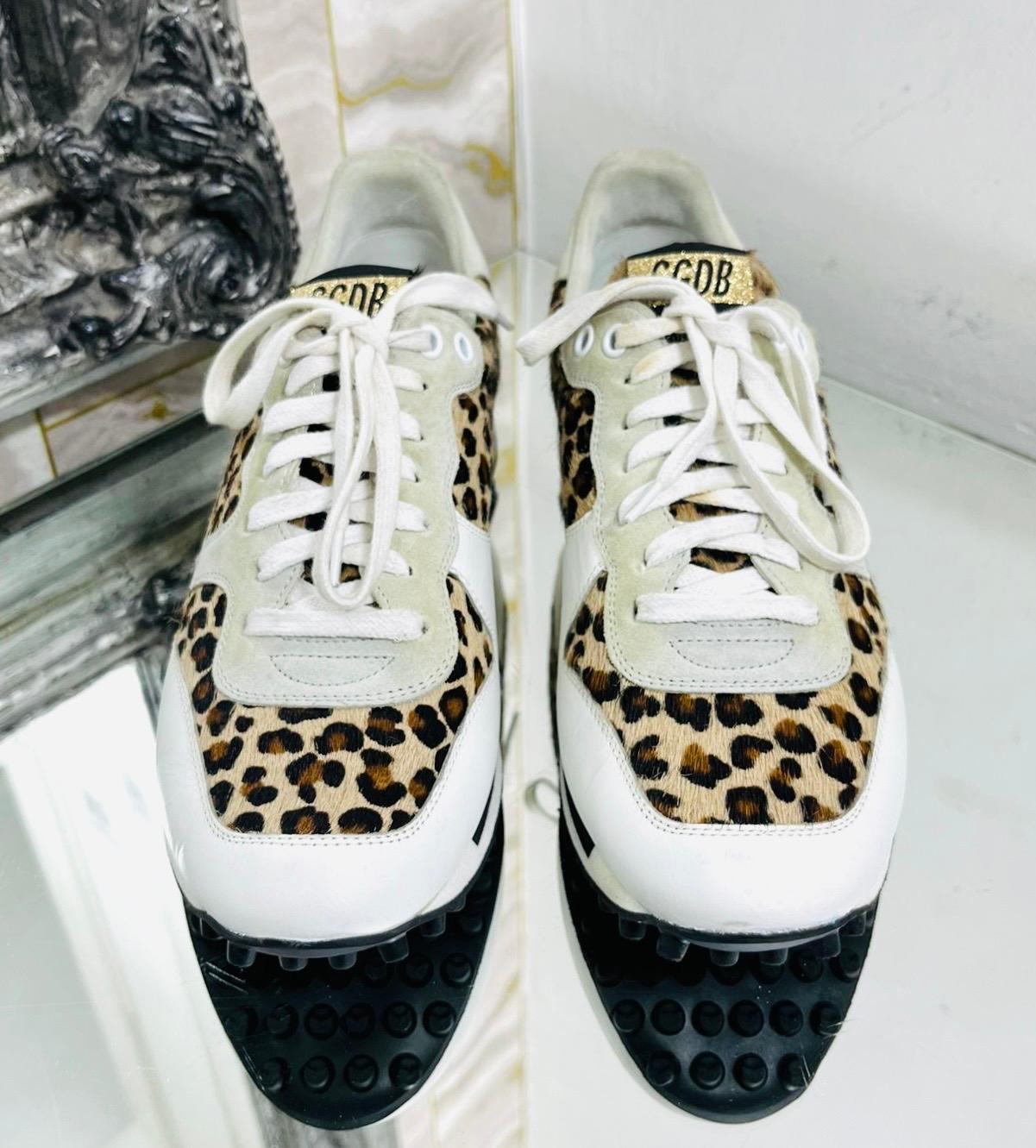Golden Goose Starland Calf Hair, Suede & Leather Sneakers

White trainers designed with leopard print calf hair inserts.

Featuring light grey suede eye stays and black pebbled soles. 

Detailed with gold 'GGDB' logo to the tongue and suede logo