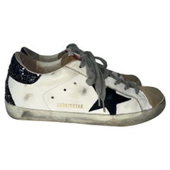 Zapatillas bajas «Super-Star» de Golden Goose con lengüeta brillante en la talonera, en piel de vacuno blanca