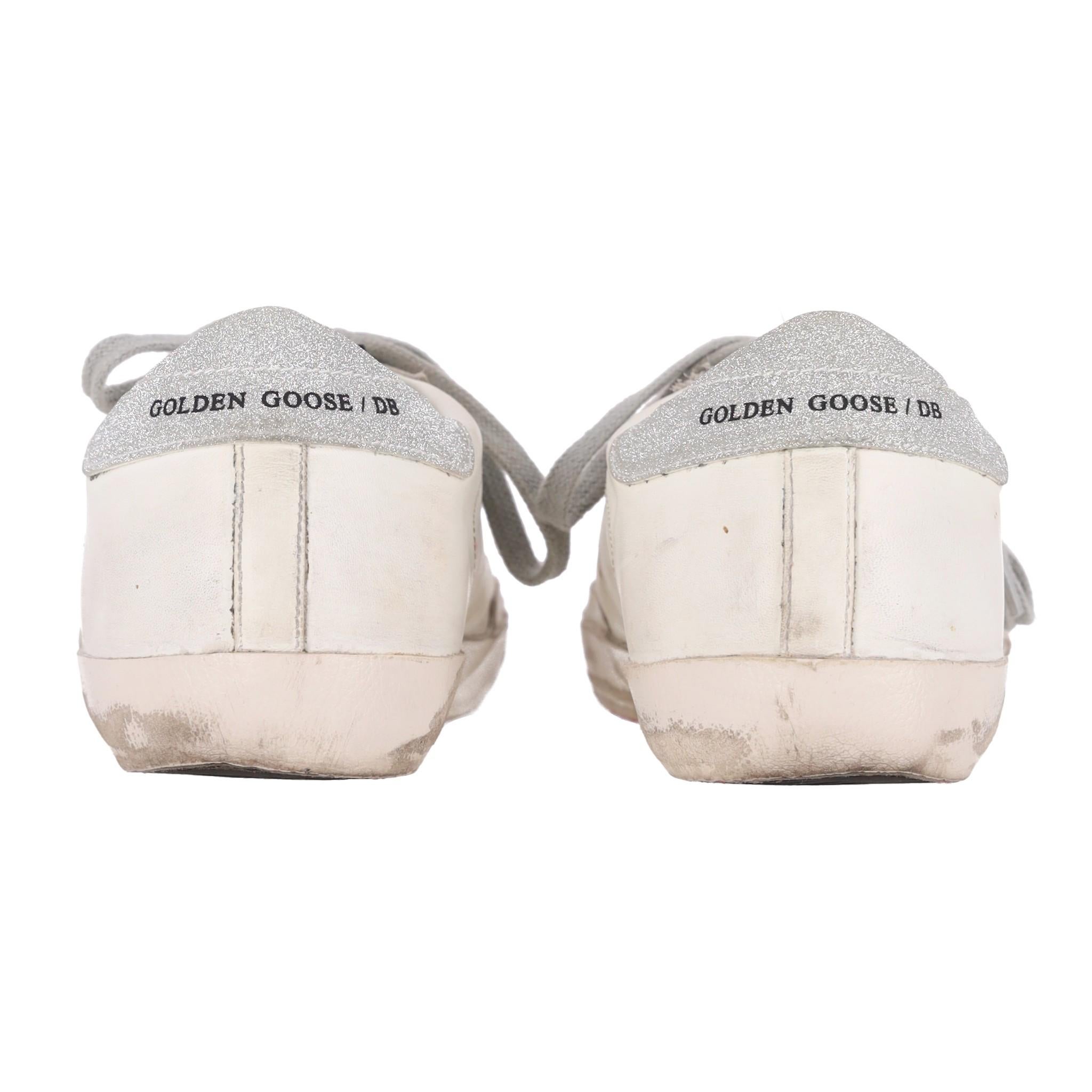 De las mujeres Zapatillas de piel Golden Goose Super-Star